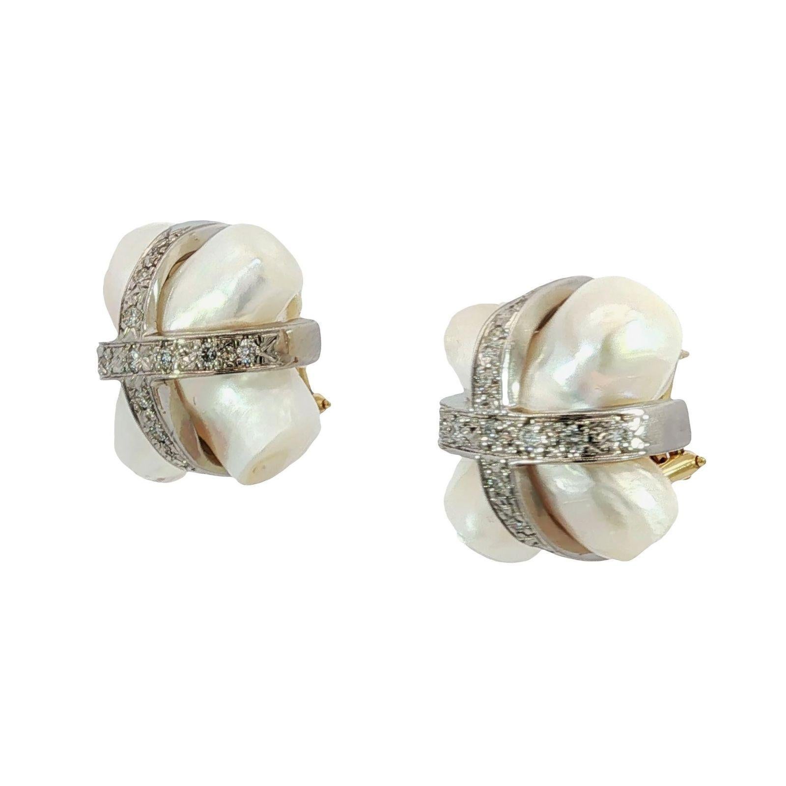MAZ Pearl Diamond Earrings 18K Mother of Pearl White and Yellow Gold ~.78ctw

These sophisticated clip-on earrings feature round white diamonds totaling 0.78 carats, set in an intersecting design over lustrous white freshwater pearls. The