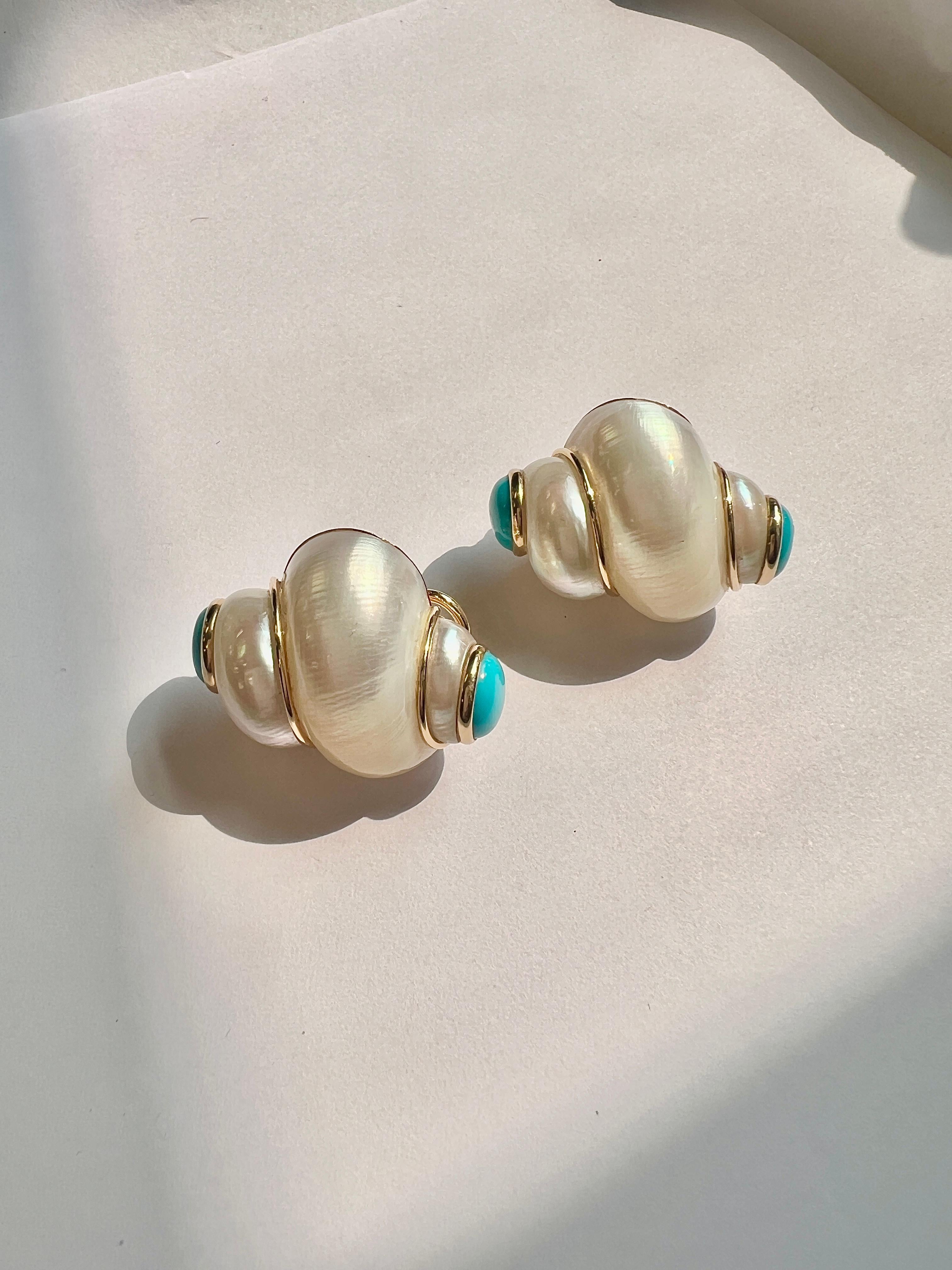 Pair of 14k yellow gold shell earrings by Maz, with turquoise cabochons. 
Earrings measure 31mm x 23mm.
Marked MAZ 14k. 
Weight - 17.7 grams. 

In excellent condition 