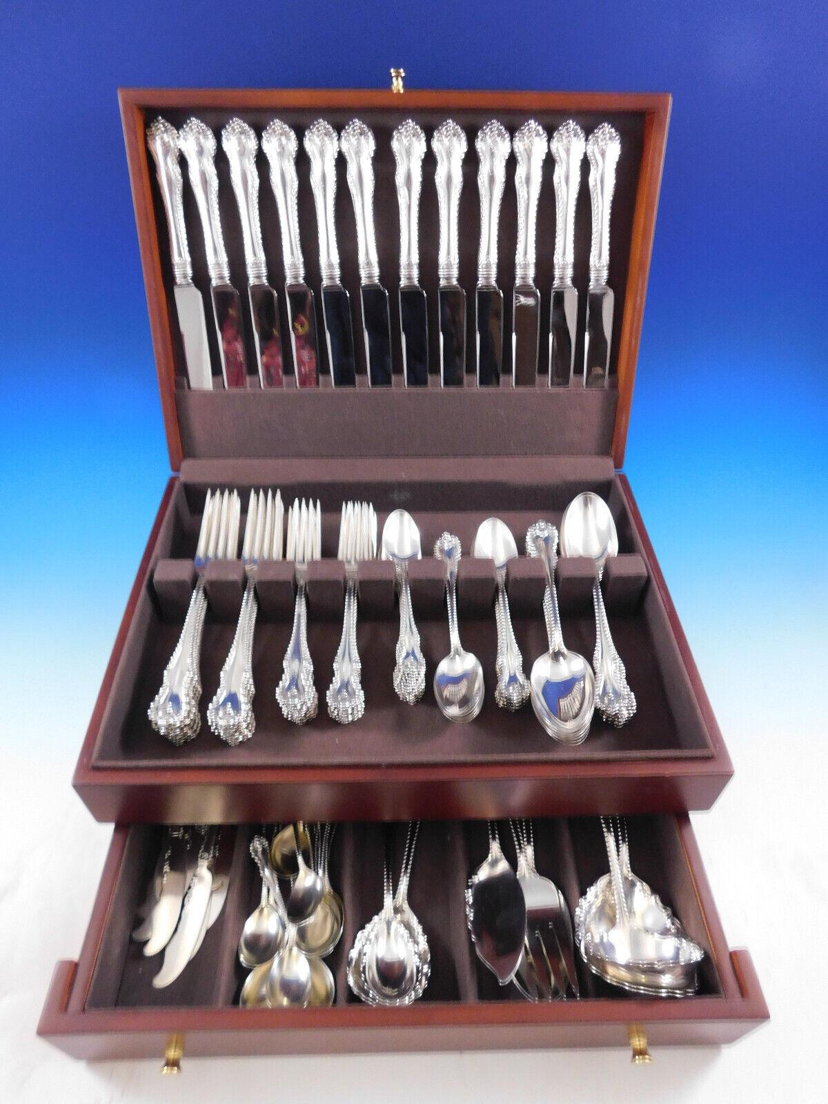 Mazarin by Dominick & Haff 
Gorgeous vintage sterling silver Flatware set in the pattern MAZARIN BY DOMINICK & HAFF. This set includes:

12 Dinner Size Knives, 9 3/4