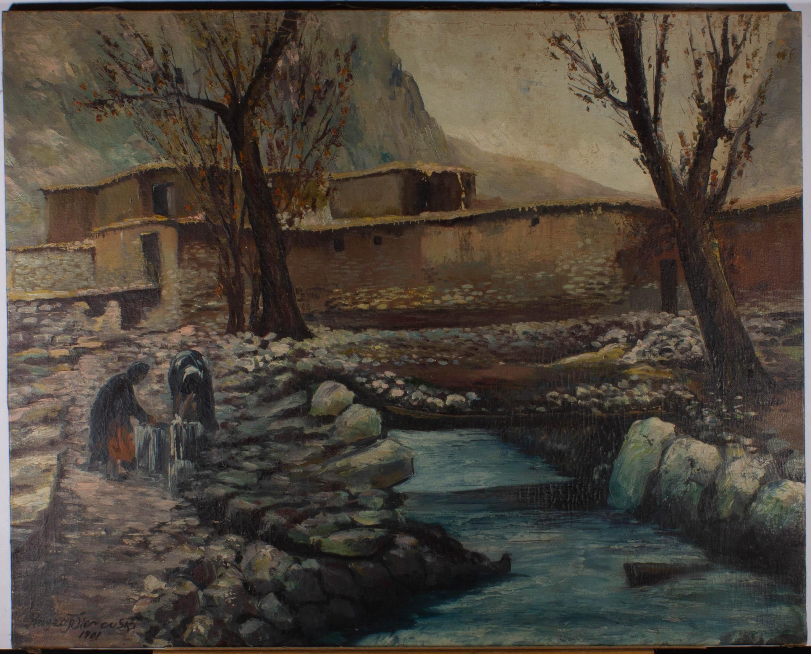 An atmospheric Eastern European scene showing to figures, washing clothes at the rocky bank of a river by the walls of a small village. The artist has signed and dated to the lower left corner and the painting is on canvas over stretchers. On