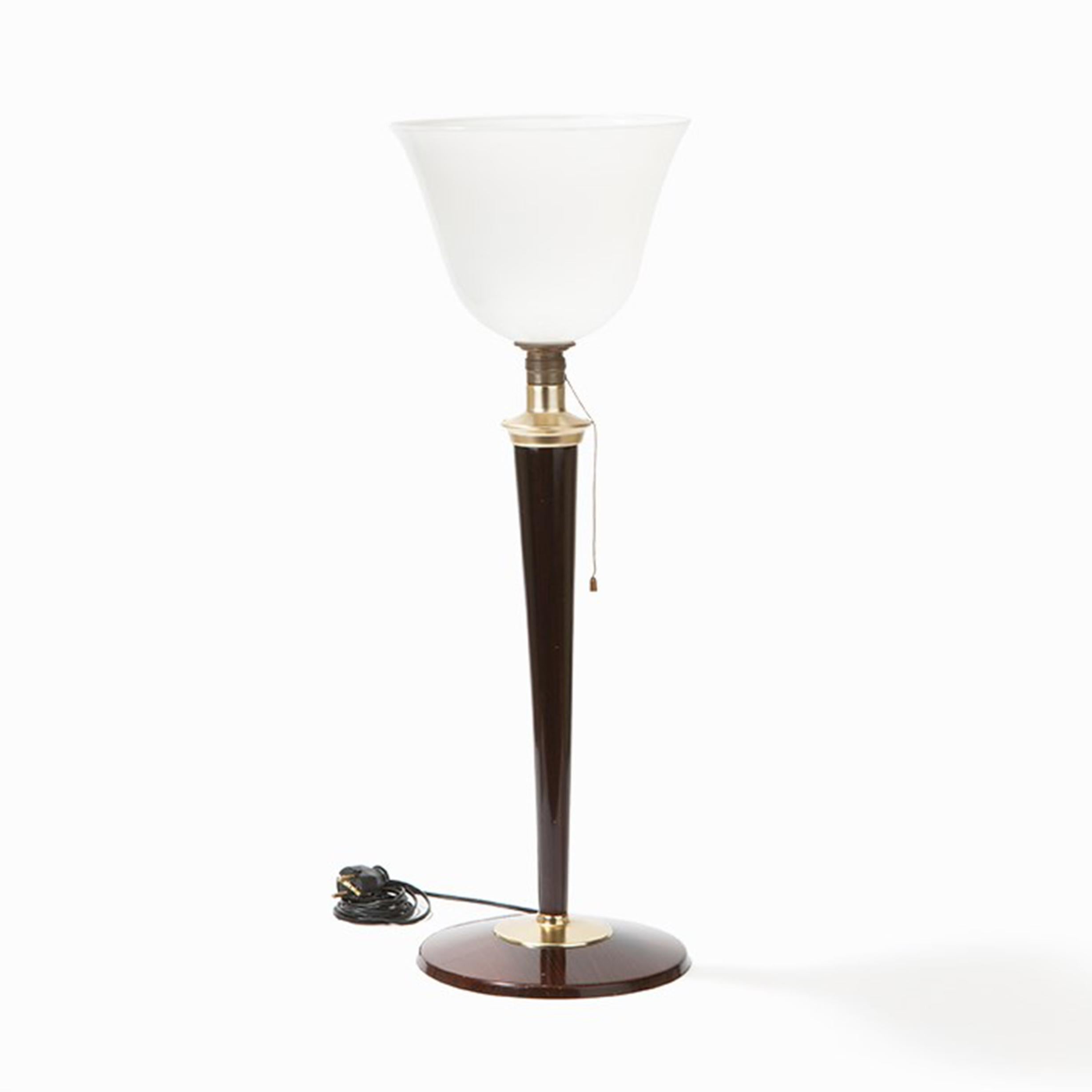 Art Deco desk uplighter lamp, designed by Mazda France in the 1930s. Mahogany lacquered metal base, wooden body topped with tulip shaped opaline glass shade and brass fittings. UK wired.