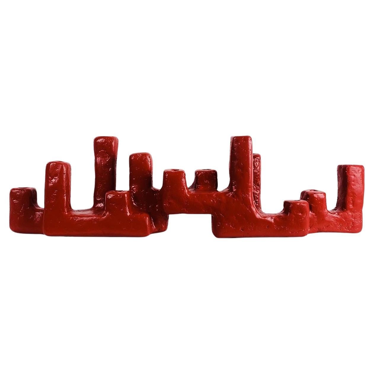 The Maze Candelabra by Brent Warr is a striking fusion of sculpture and function, conceived as a bold architectural gesture for the modern interior. Each piece is built from a wood core and shaped using Brent’s signature gypsum, pulp, and epoxy