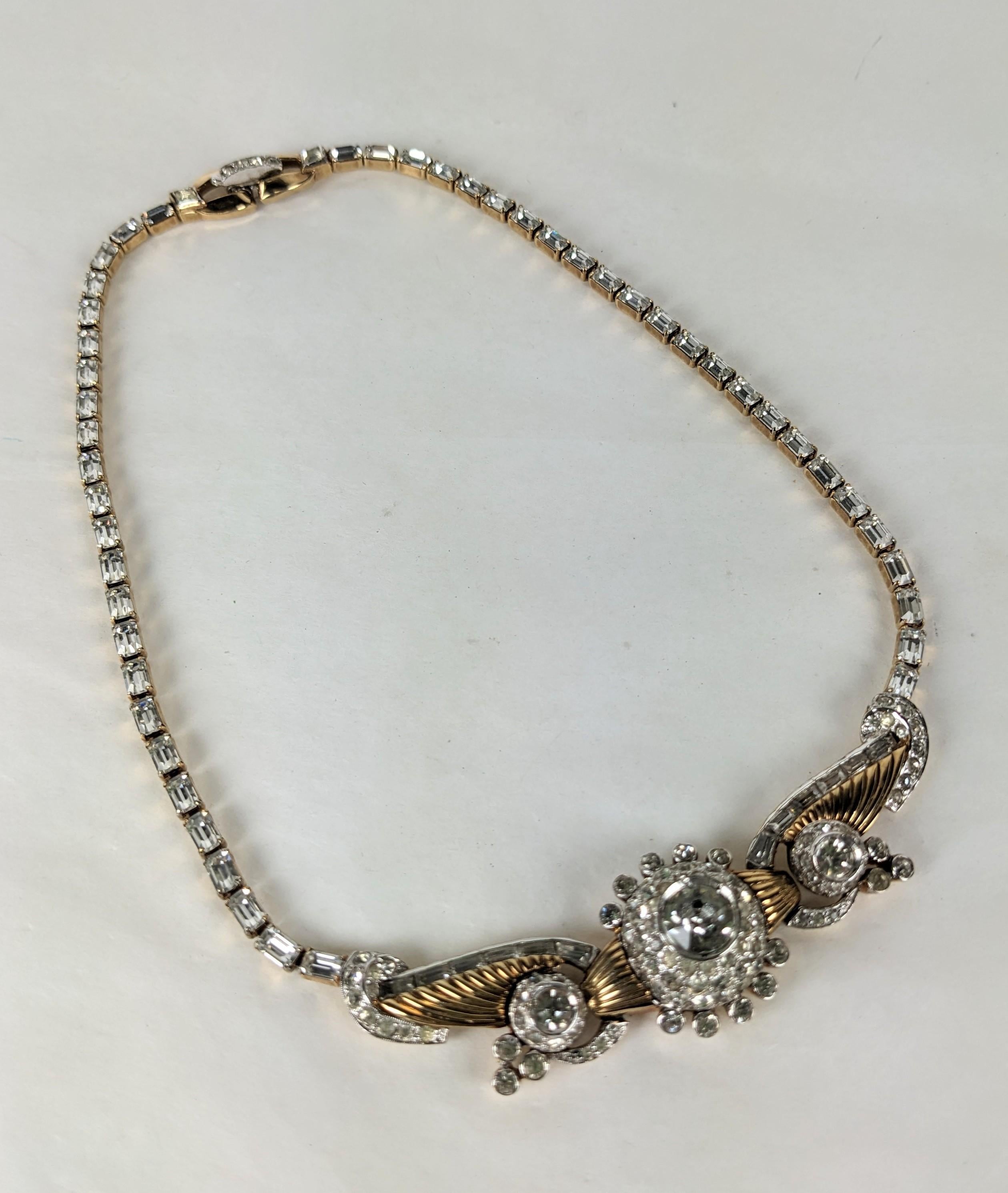 Lovely Mazer Retro Gold and Paste Necklace from the 1940's. Central motif of ribbed gold and rhinestone pastes on a baguette link chain. Signed on clasp. 1940's USA. 16