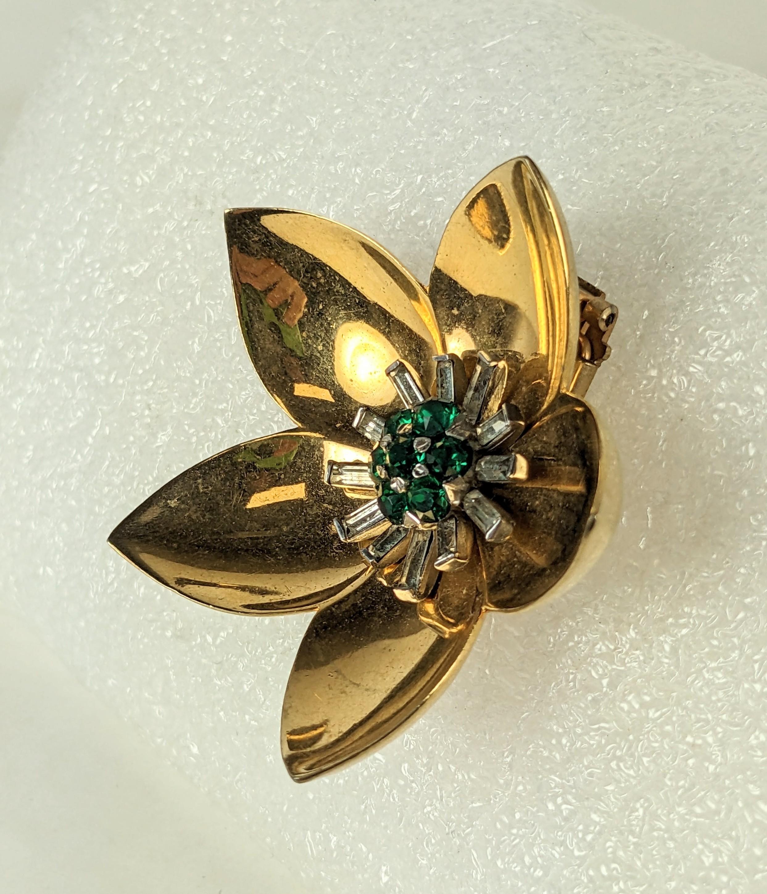 Mazer Retro Lotus Flower Clip from the 1940's. Dimensional cupped design which has a mirror effect when worn. Central cluster of emerald pastes and crystal baguettes. Clip back fittings, Signed Mazer. 2