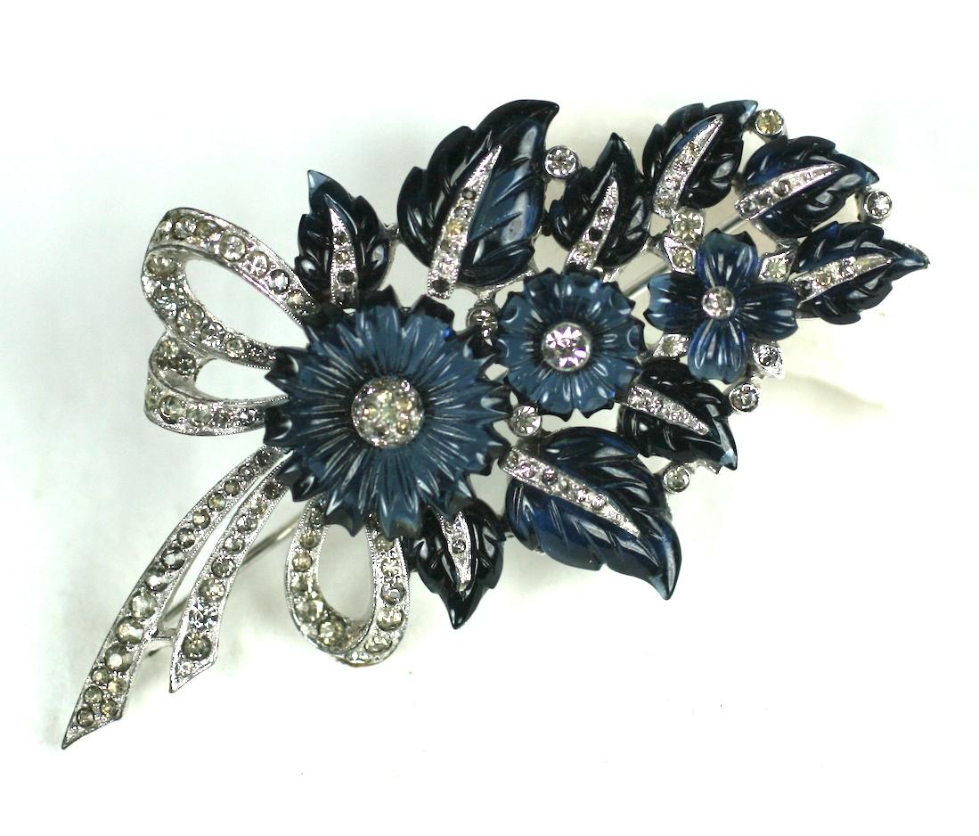 Mazer sapphire fruit salad flower  and leaf large bouquet brooch. Composed of signature faux sapphire glass, pressed then hand finished. Round daisies and vari size pointy leaves. Set in rhodium plate base metal, with crystal rhinestone