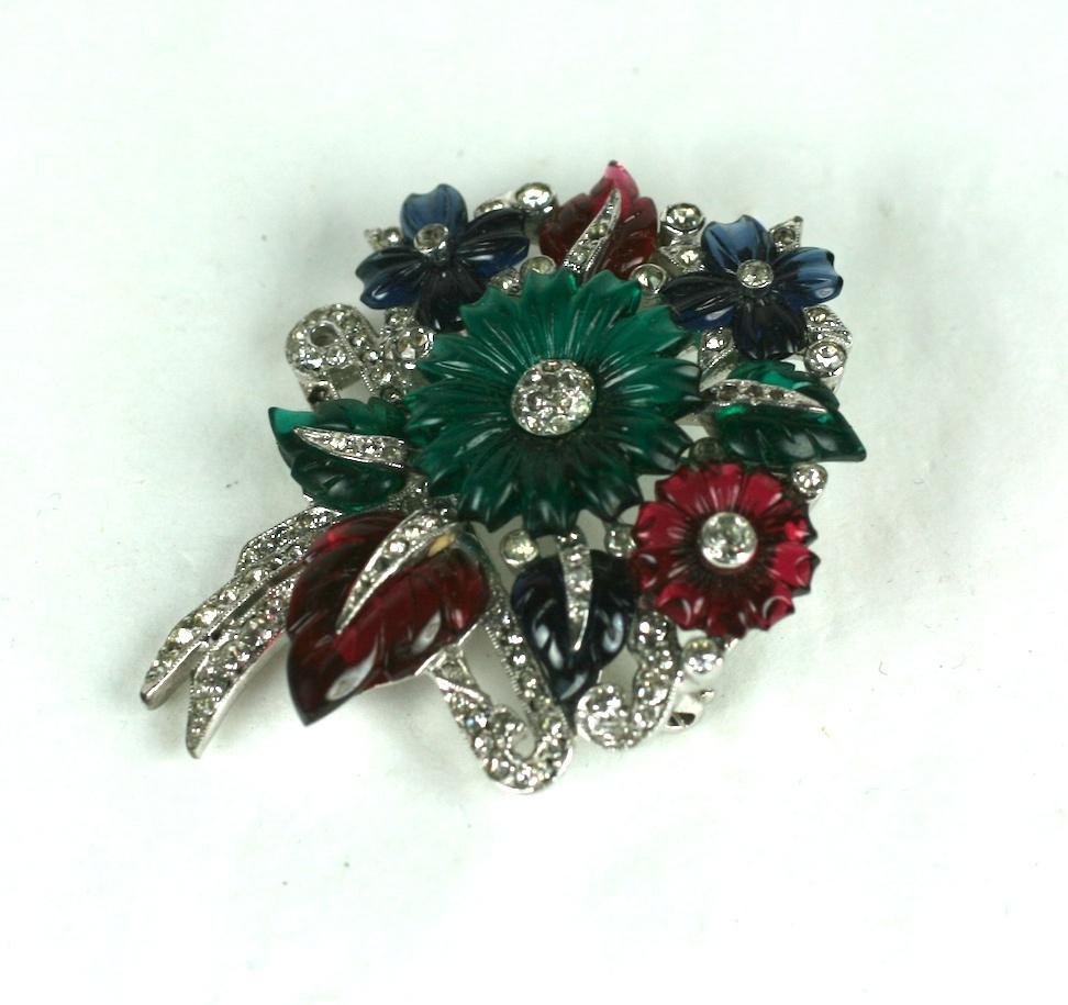 Mazer tri color fruit salad flower and leaf large bouquet brooch. Composed of signature faux sapphire,  emerald and ruby glass, pressed then hand finished. Round daisies with vari size pointy leaves. Set in rhodium plate base metal with crystal