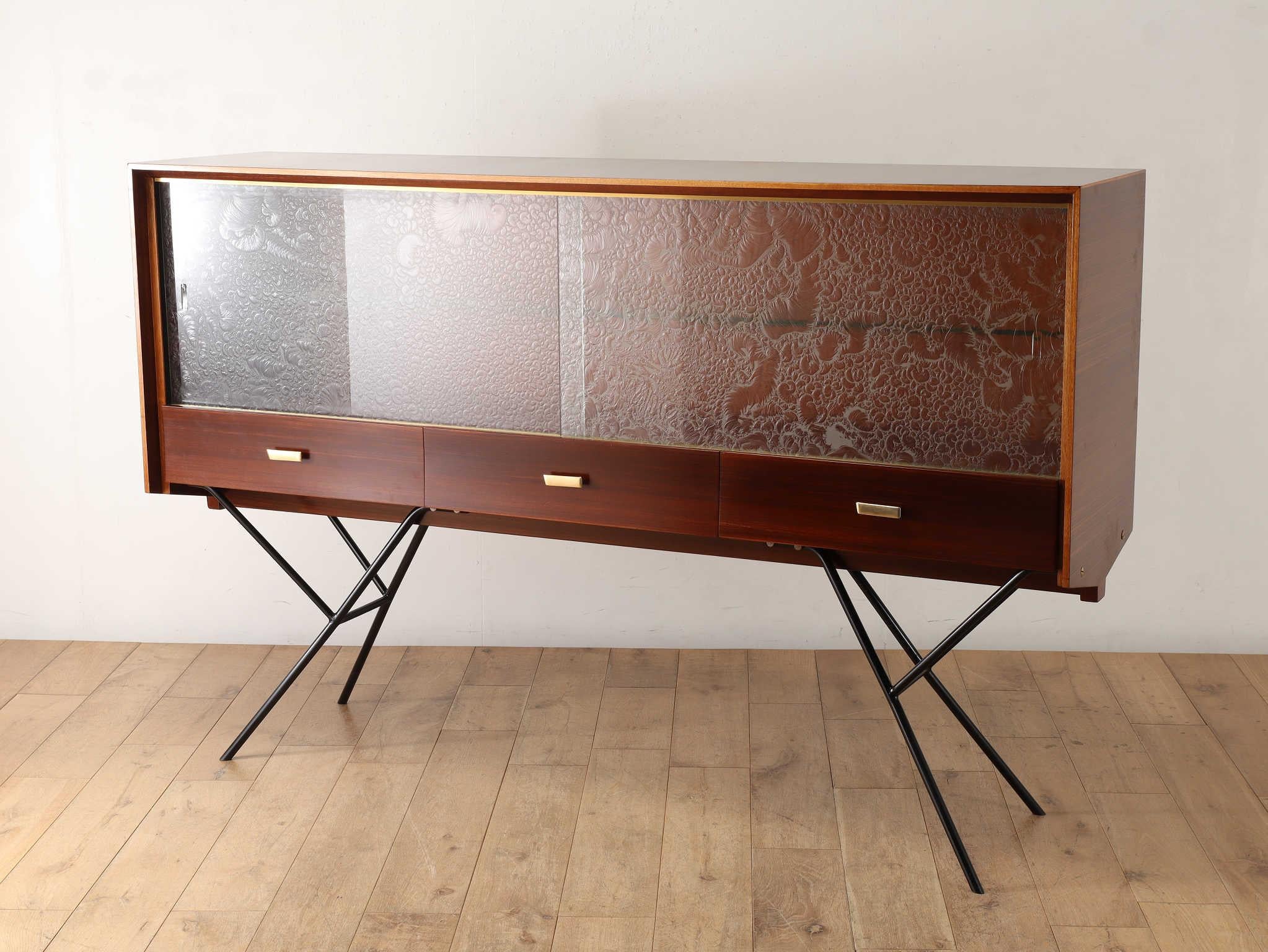 his elegant sideboard is a creation of Miguel Rodrigo Mazure, a distinguished architect and designer who studied at the National University of Engineering (UNI) in Peru. After honing his skills at the prestigious SOM (Skidmore, Owings & Merrill)