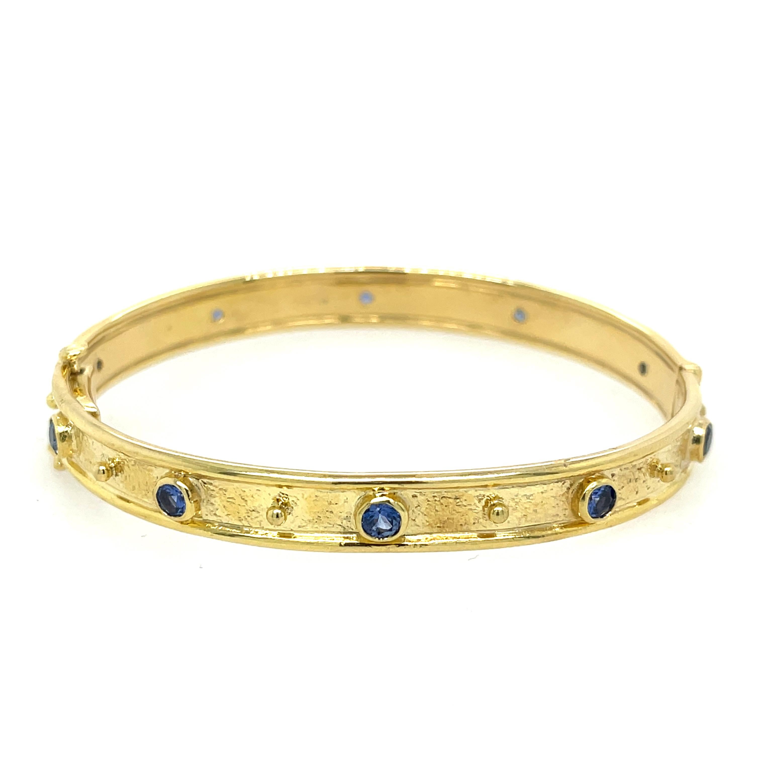 Mazza 14K Sapphire Hammered Bangle. The Bangle Features 10 Round Blue Sapphires.
7.3mm Wide
21.2 Grams