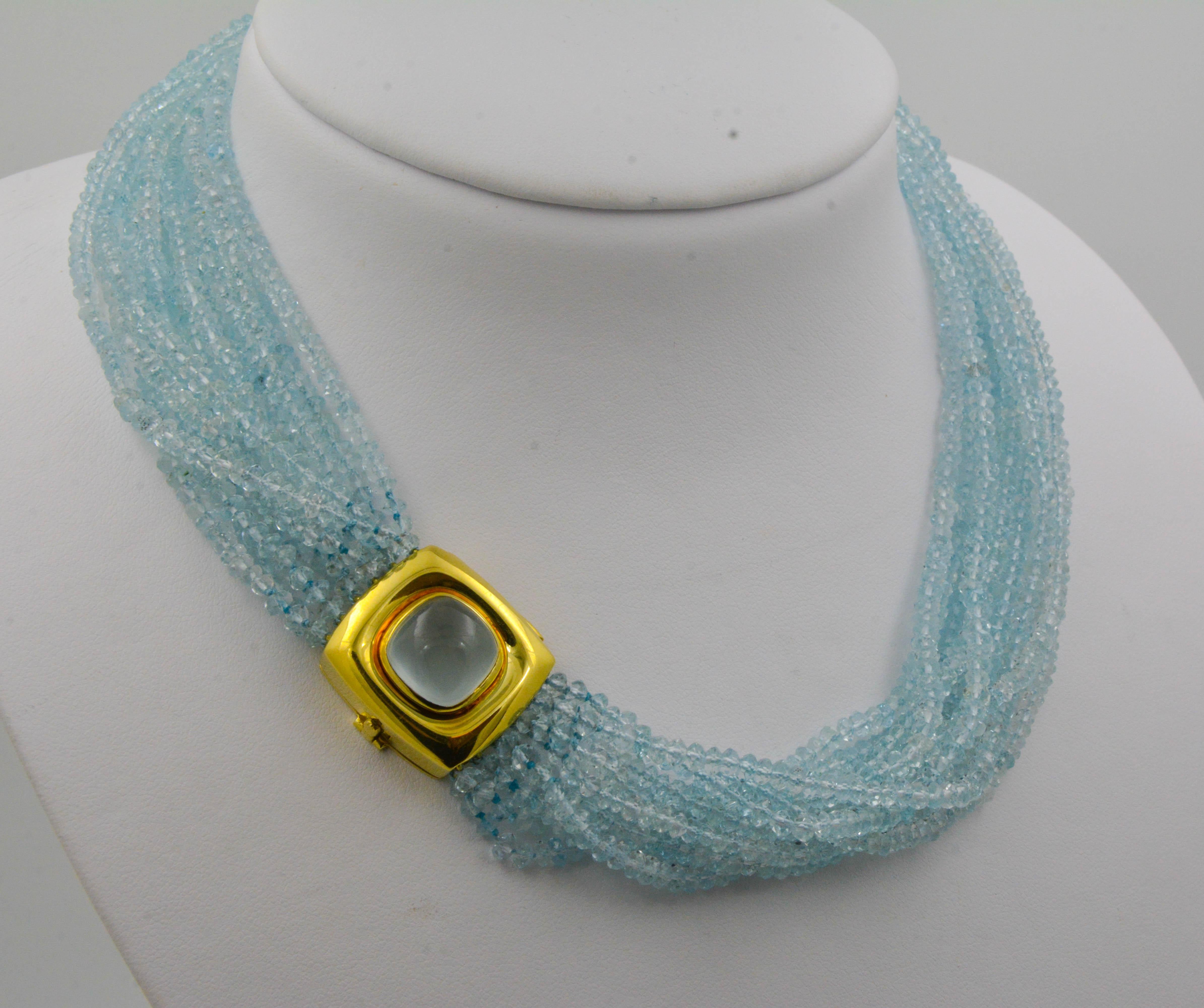 From our Estate collection, comes an original convertible piece from the Mazza Company.  Perfect for the lady born in March, this 18 karat yellow gold beaded Aquamarine bracelet & necklace can be worn individually or strung together to create a long