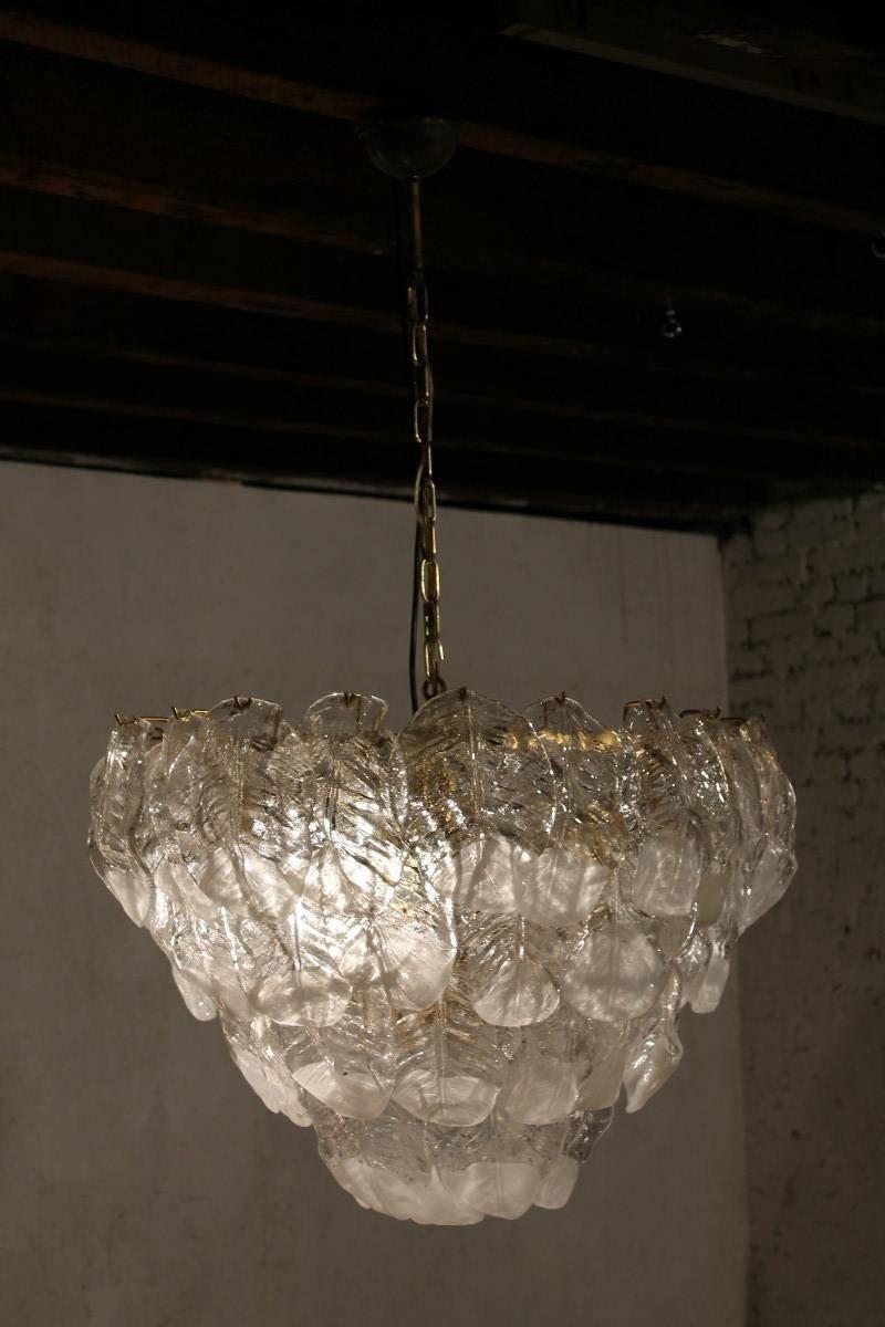 Vintage Mazzega glass leaf chandelier, Italy, 1960s
clear and white glass leaf on metal frame 
five large light bulbs, 75 watts each
also wired for US use 
complete and working condition.