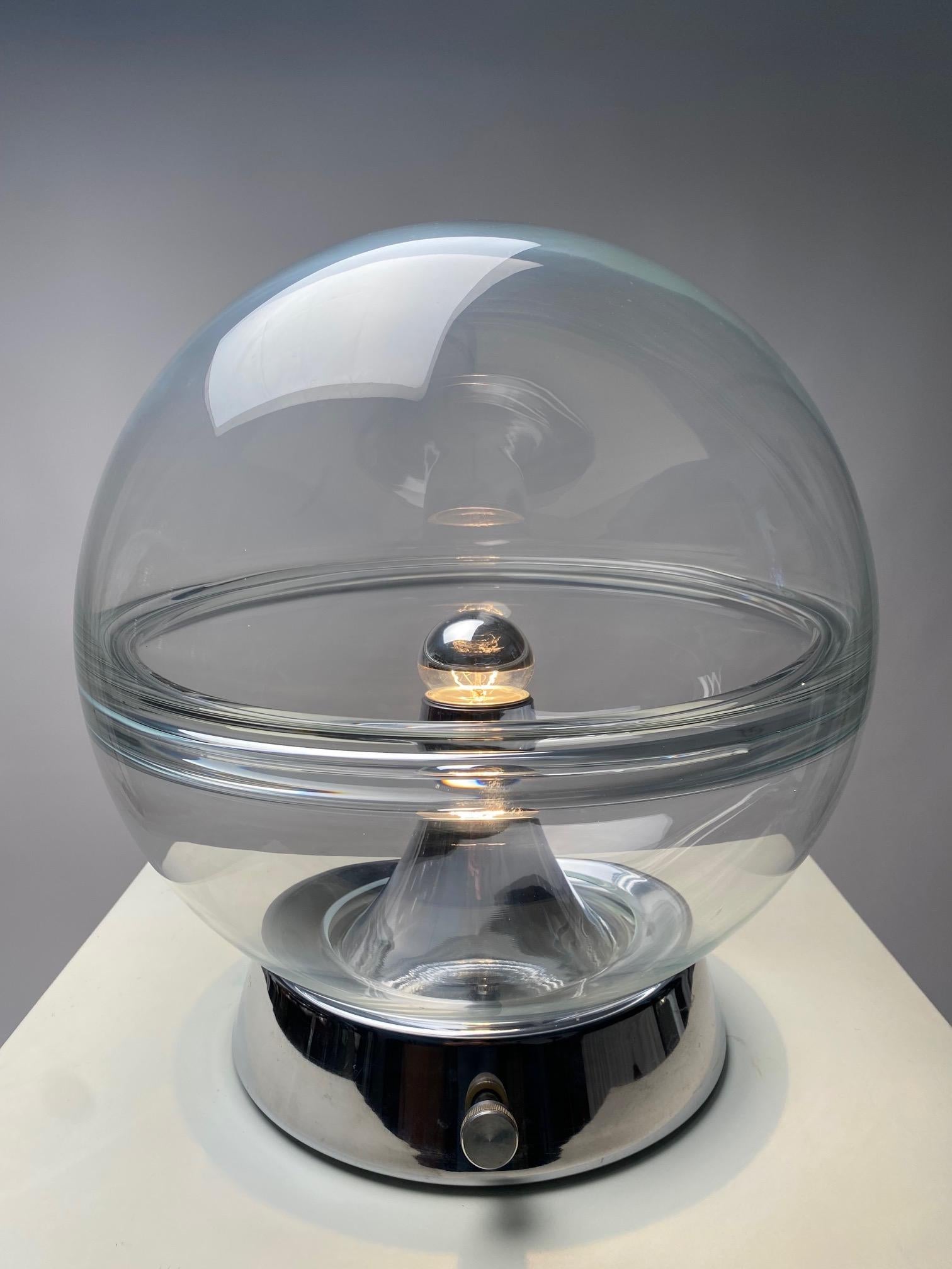 Spherical table lamp with very thick glass, chromed metal base, adjustable light intensity, attributable to Carlo Nason Mazzega, Italy, 1970s