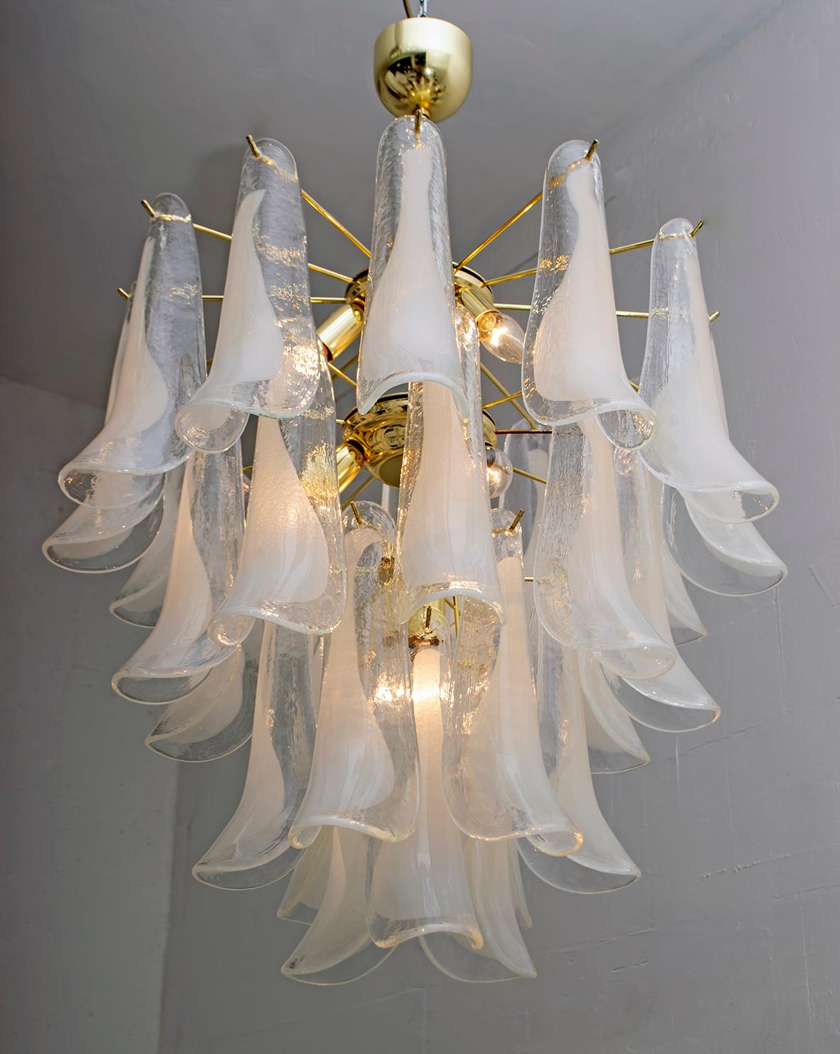 A very elegant chandelier, with glass elements called 