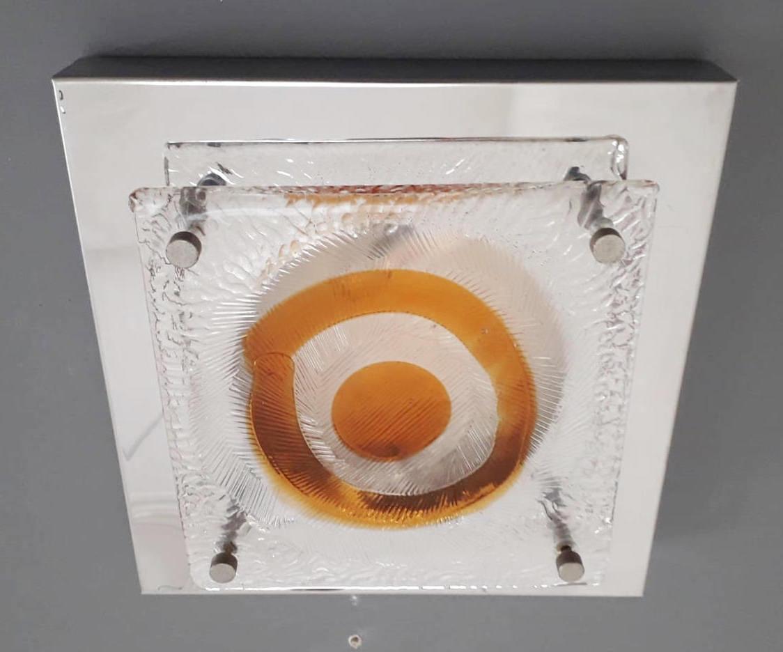 Italian vintage wall light or flushmount with a clear and amber Murano glass diffuser mounted on chrome frame / Made in Italy, circa 1960s
2-light / E12 or E14 type / max 40W each
Measures: length 10 inches, width 10 inches, height 3 inches
1