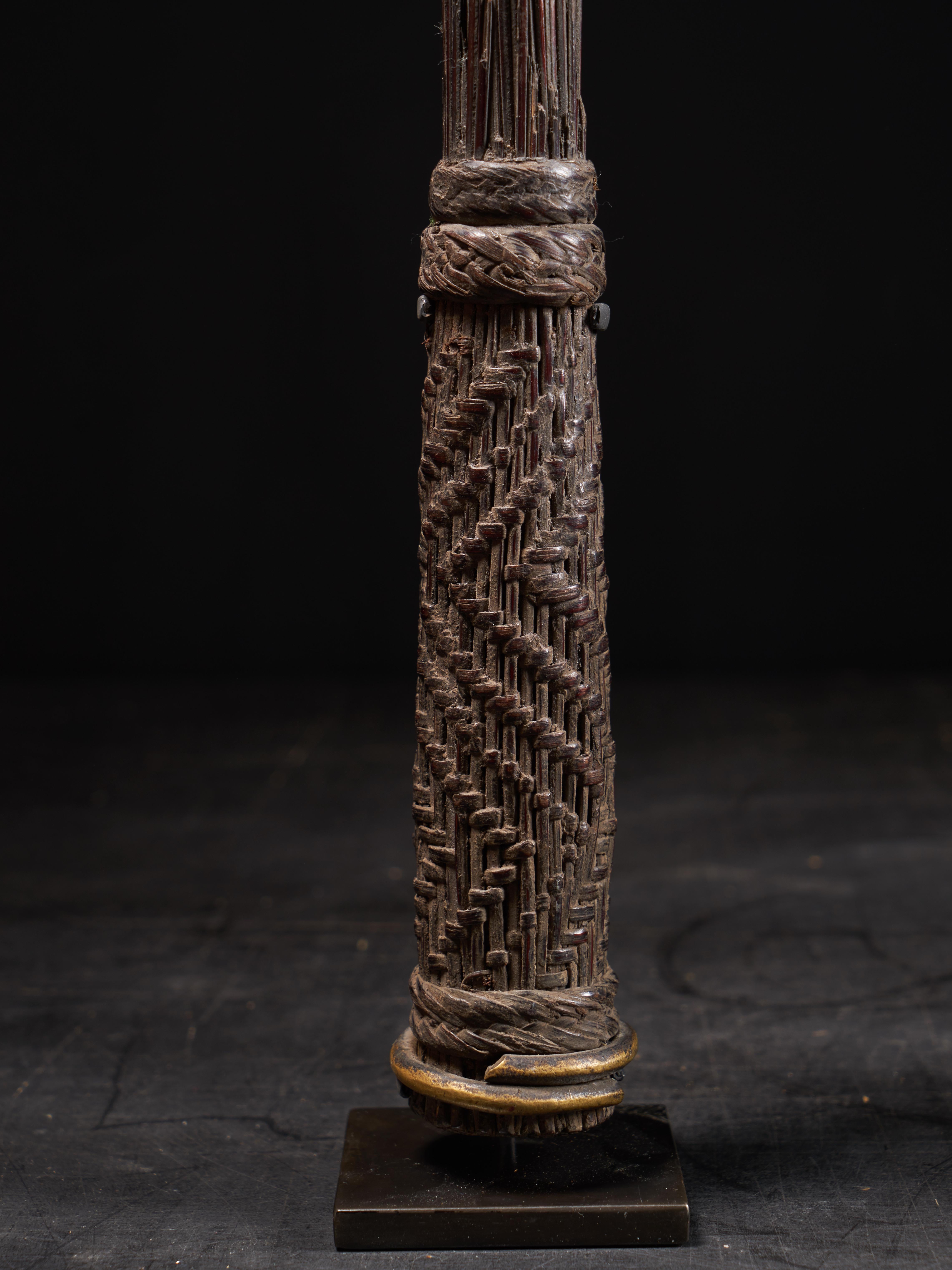 The Sceptres are made of the Midrib of Palm tree leaves. They were uses by the members of the Lilwaa Secret Society of the Mbole Tribe that live in the South -Western part of Kongo. The finishing are very minimalistic and refined.