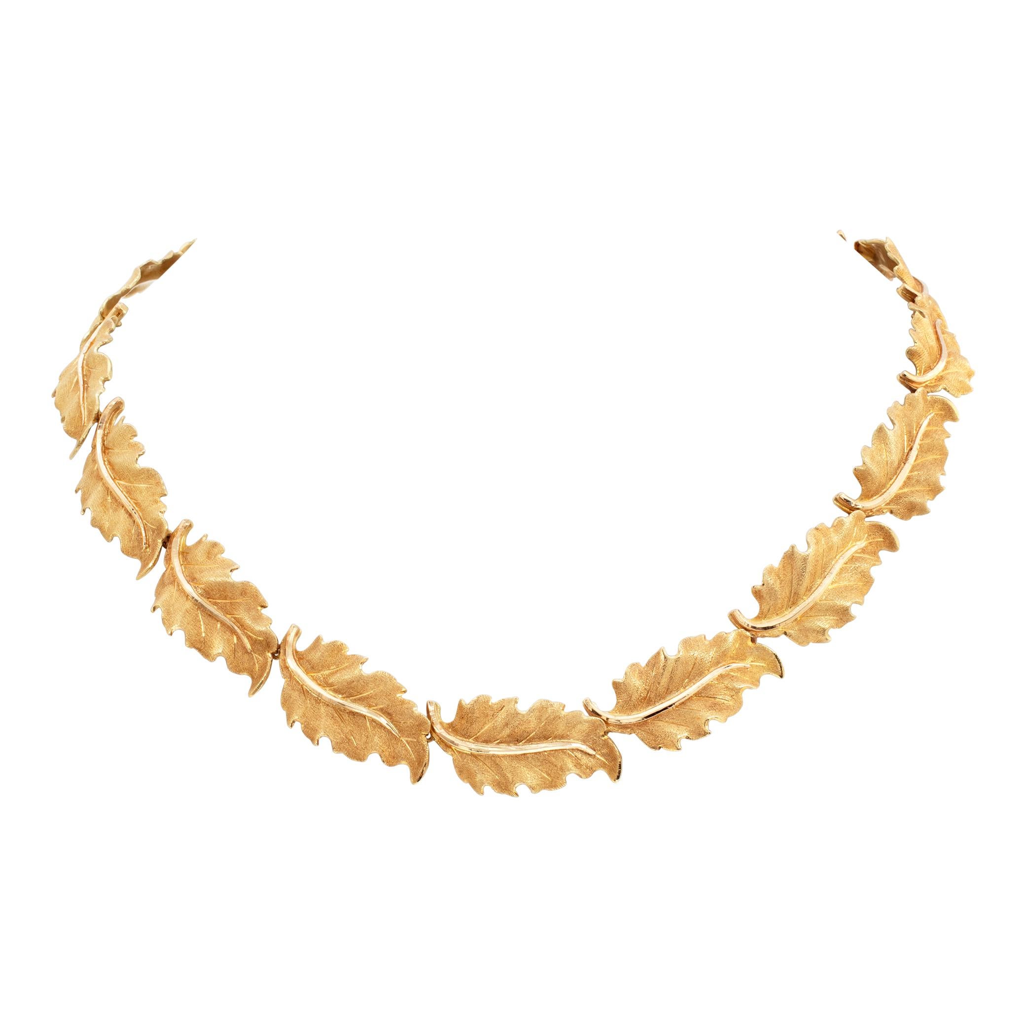 Italian designer M.Bucellatti  5 pieces complete parure Leaf set (necklace, earrings, cuff and ring) in 18k yellow gold. Pieces are signed M.Buccellati. Organic leaf motif, accented with the characteristic Buccellati's incised and chiseled patterns.