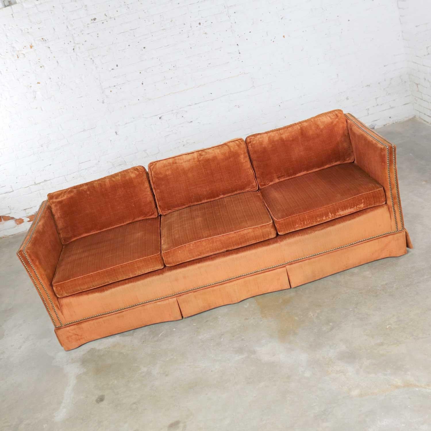 burnt orange velvet couch