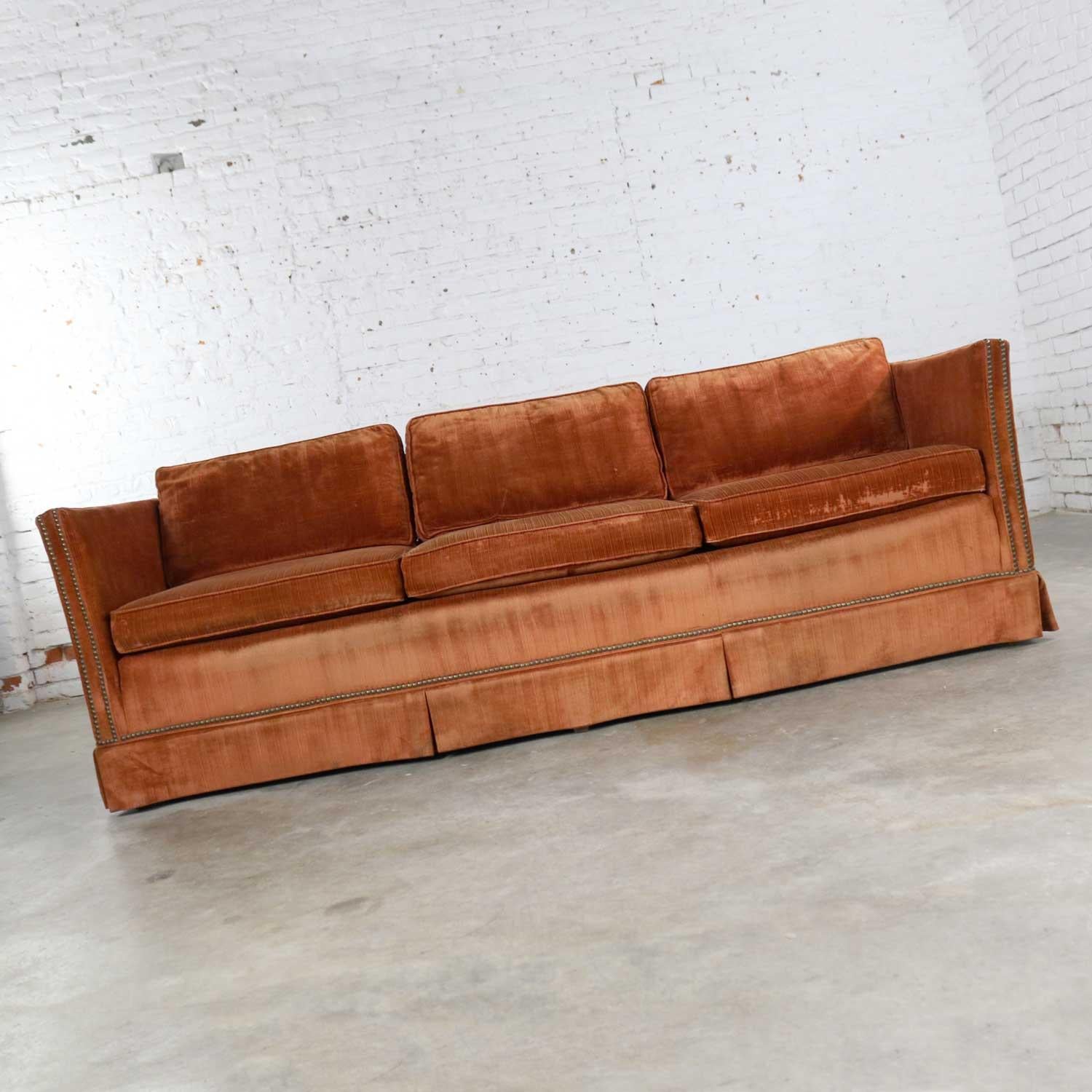 burnt orange velvet sofa