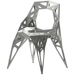 MC08 Silla de Forma Inagotable Serie Acero Inoxidable Negro y Plateado Exterior