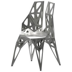 MC10 Silla de Forma Infinita Serie Acero Inoxidable Personalizable Negro y Plateado