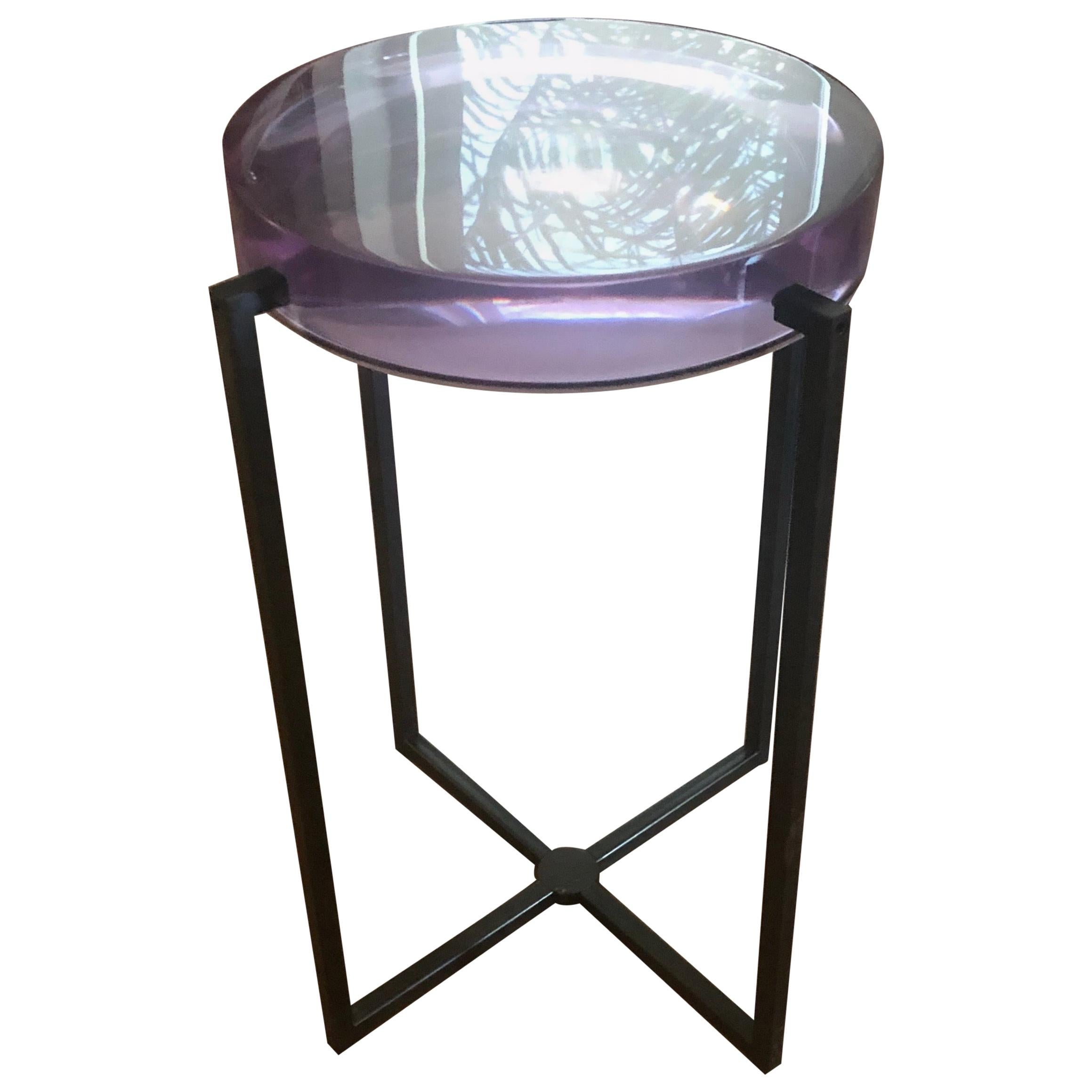 Occasional drinks side or end table rendered in highly polished amethyst resin top, backed with a tinted mirror and matte black patinated steel legs. Designed by McCollin Bryan, London, UK, 2010s.
   