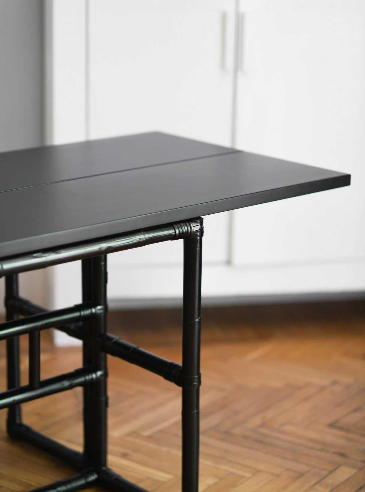 American Mcguire 70s console with opening shelf in black lacquered rattan