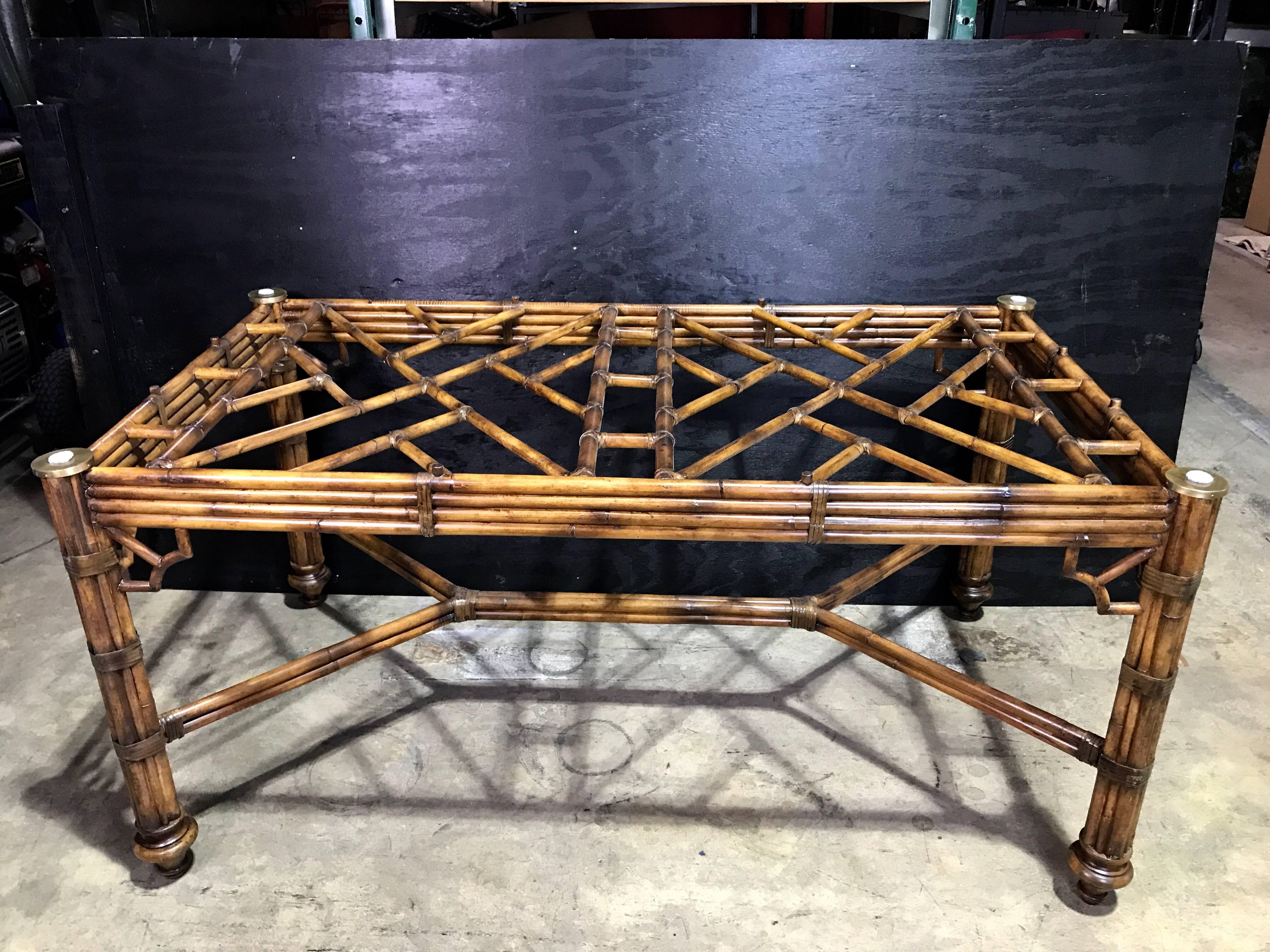 McGuire bamboo and leather rectangular dining table base, with brass and leather mounts, raised on pagoda feet.
Sold without glass.
Measures: 72