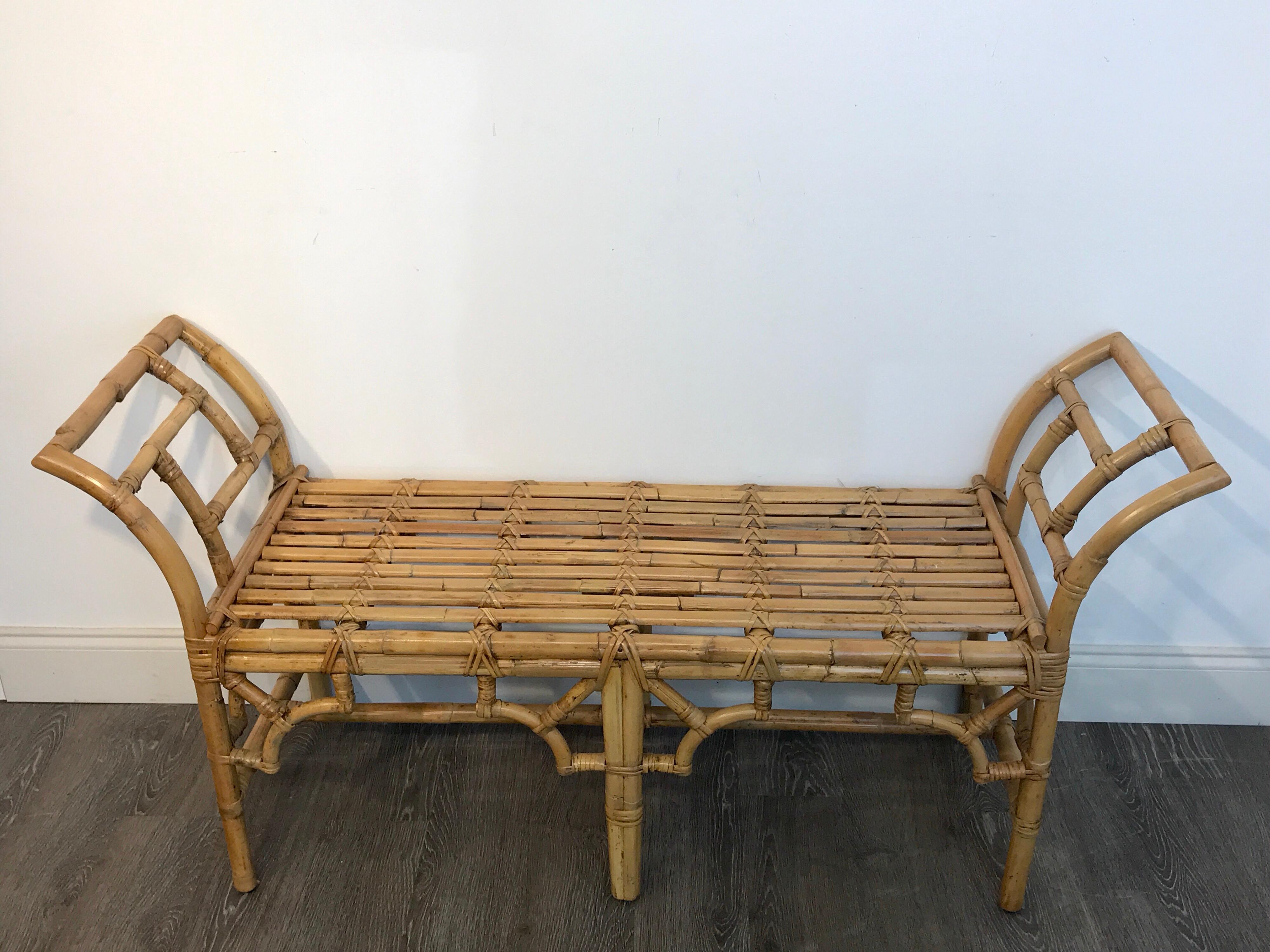 McGuire rattan and bamboo long bench, with fretwork sides, the seat measures 39