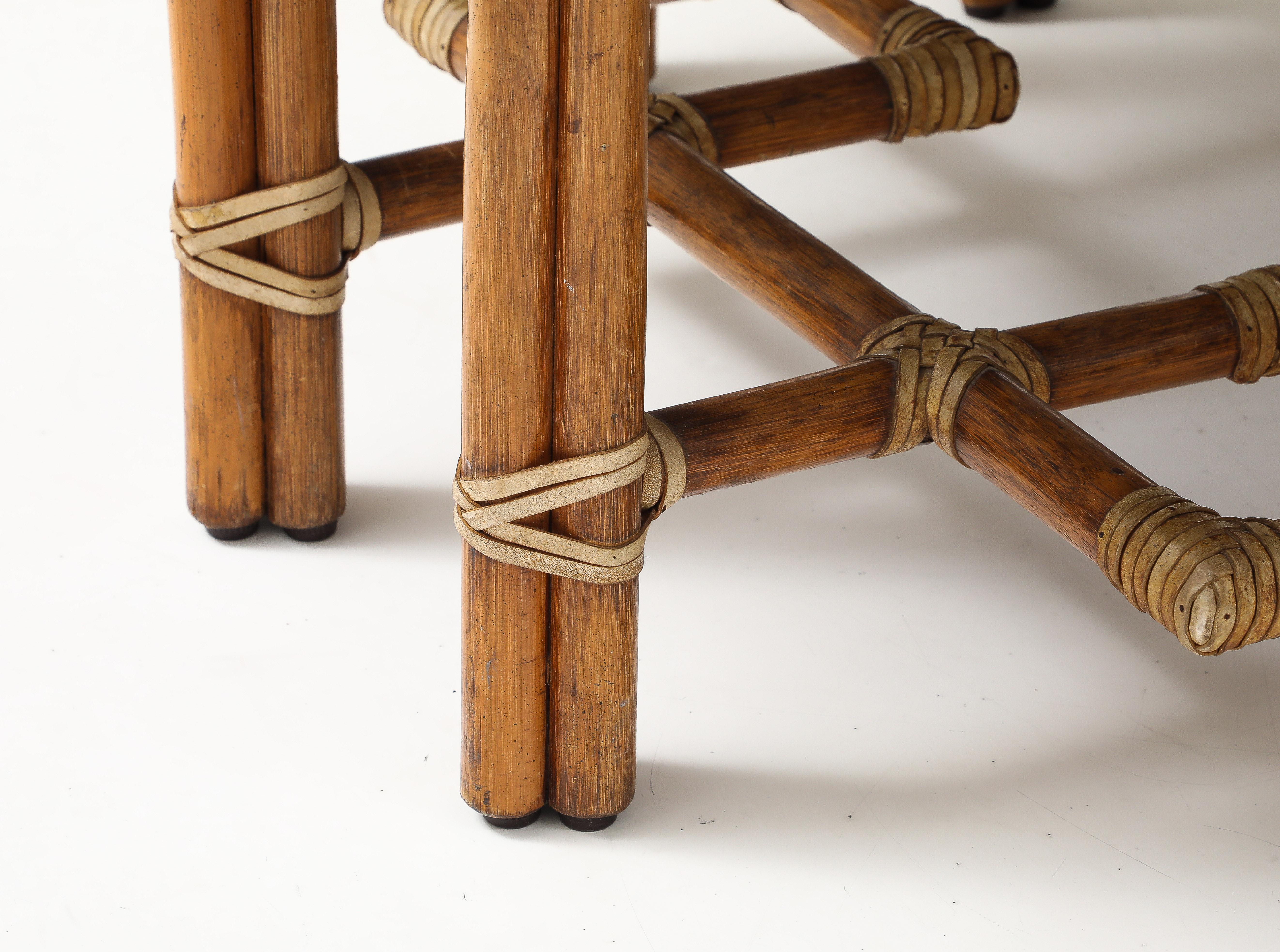 Mid-Century Modern McGuire Bamboo Coffee Table, Leather Straps, Brass and Grey Glass Round Top For Sale