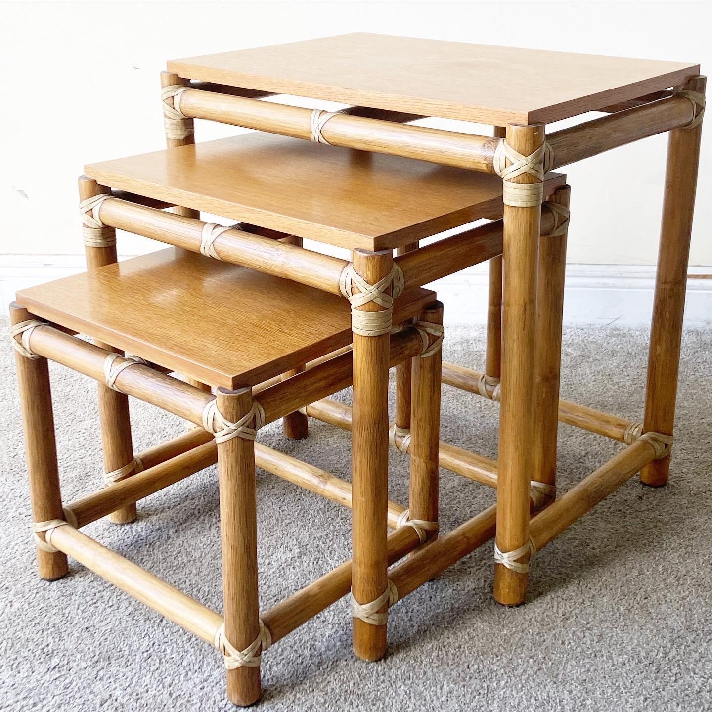 Exceptionally crafted bamboo rattan nesting tables by McGuire Furniture Co. Each table is fitted perfectly for a seamless nesting experience on the tables behalf.


Measures: Smallest table: 15”W, 13”D, 14.75”H
Middle table: 19”W, 14.5”D,