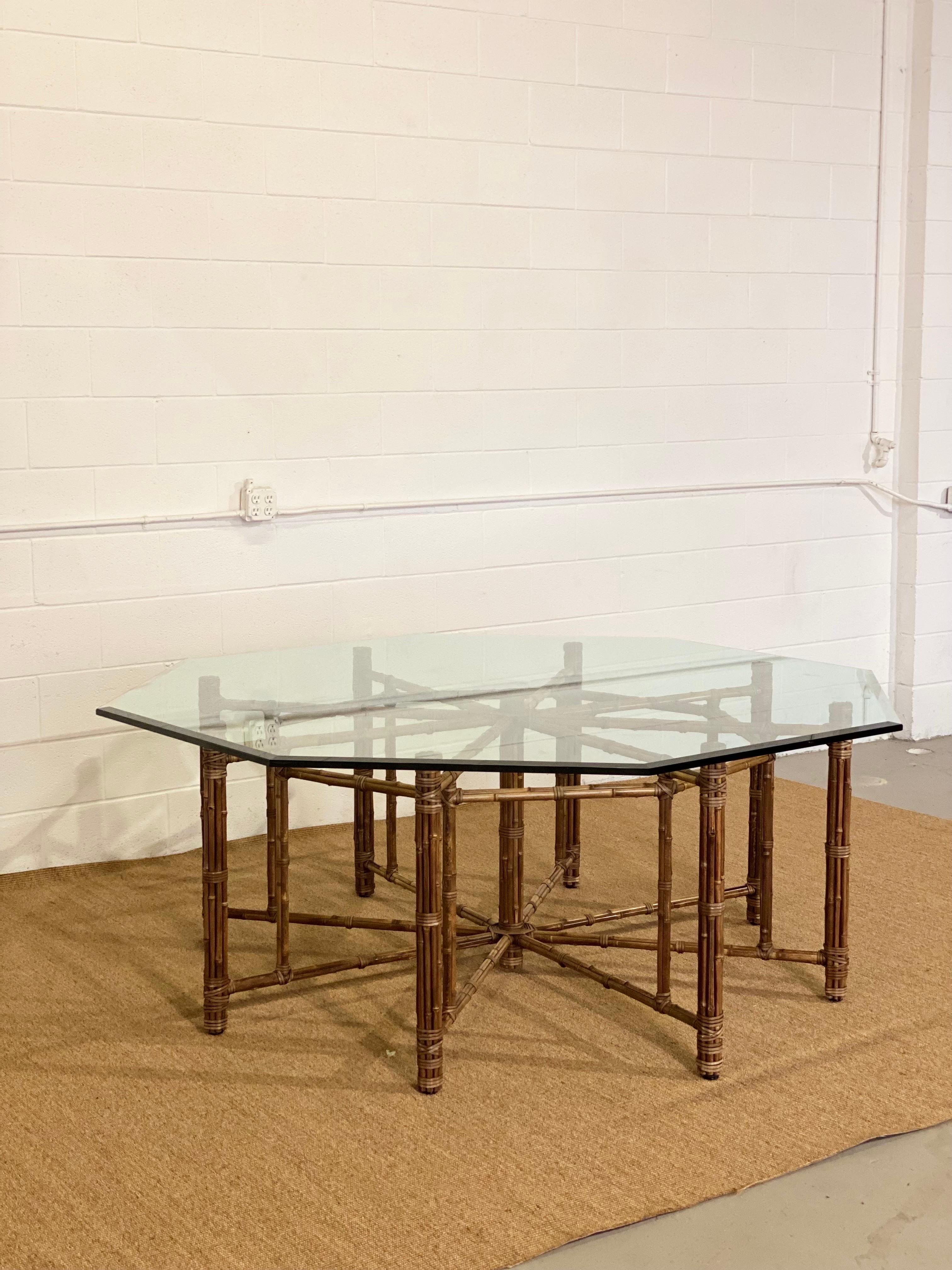 We are very pleased to offer an organic, modern-looking dining table designed by John McGuire, circa the 1990s. McGuire designs mix incredible materials, forms, and texture to create both chic and timeless furniture; moreover, his brand has an