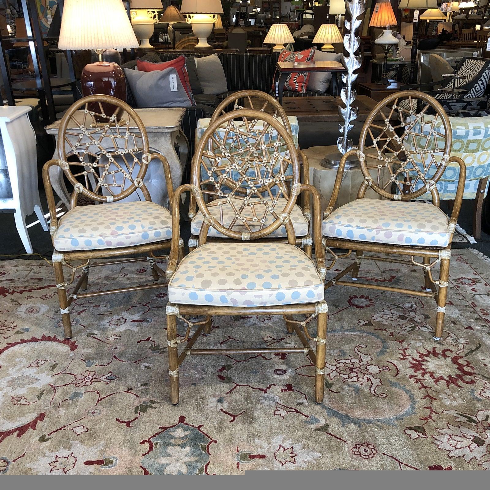 Presents a set of four cracked ice rattan dining chairs by McGuire. Designed in 1968 by Elinor McGuire. This set is circa 1990 and in wonderful condition. What an iconic chair! This McGuire staple was designed in 1968 by Elinor McGuire. Defined by