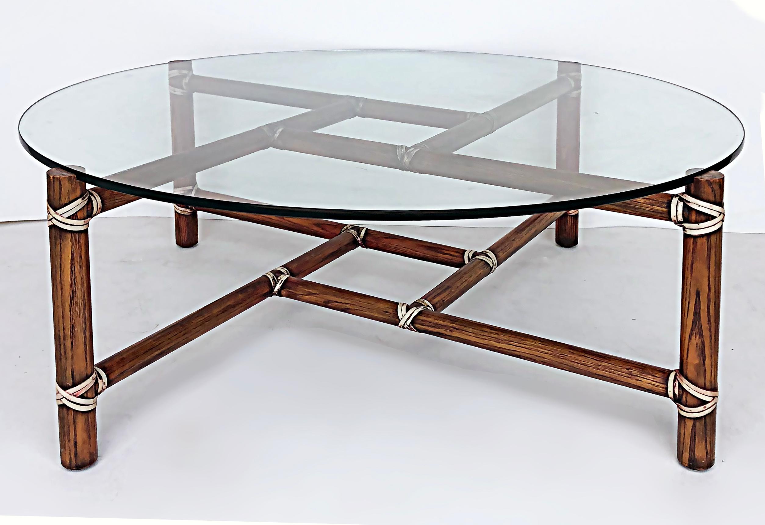 McGuire Furniture San Francisco round glass top coffee table with rawhide straps.

Offered for sale is a McGuire Furniture of San Francisco wood coffee table with a substantial round glass top. The glass is partially inset for security and the