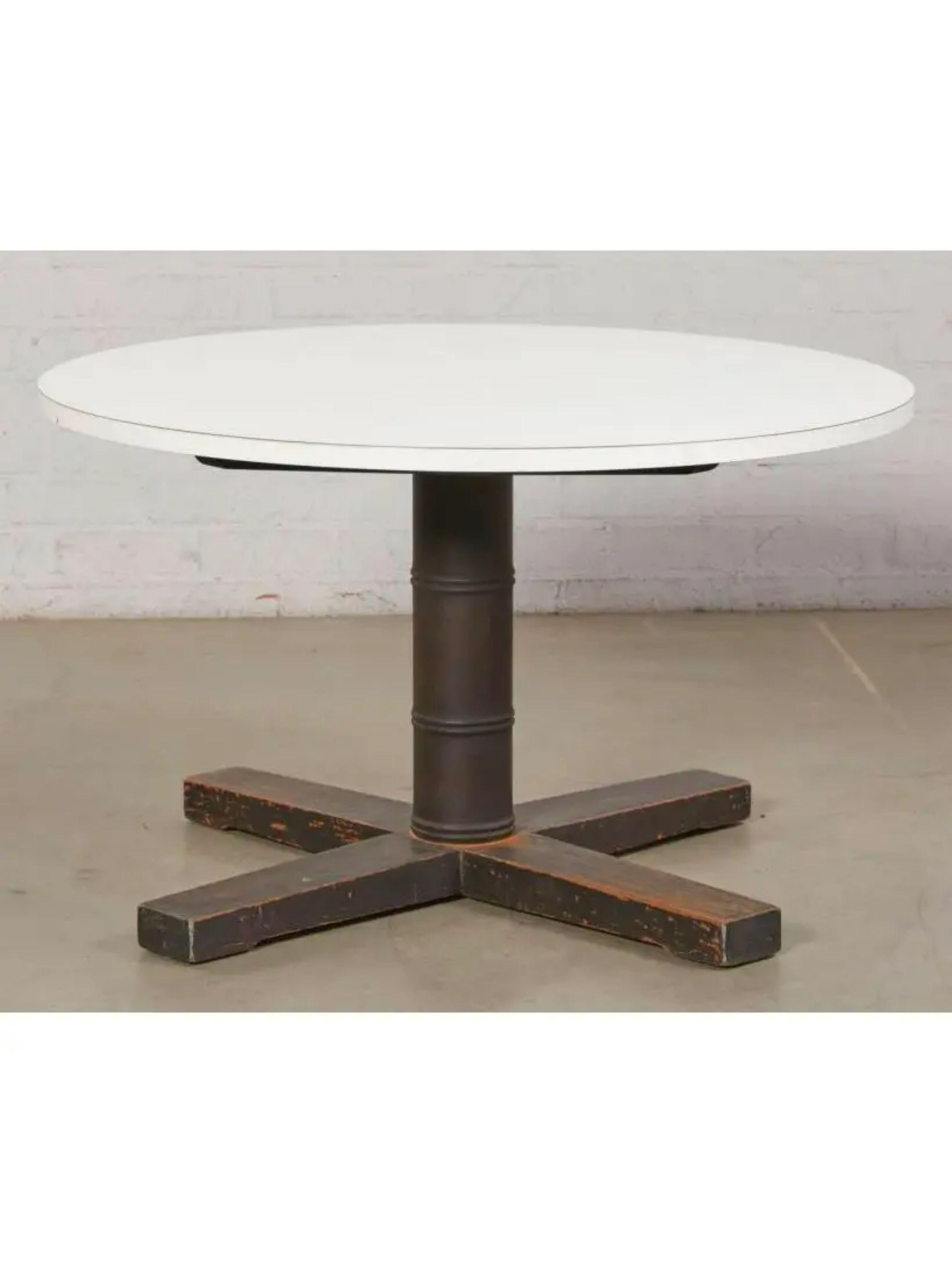 McGuire Furniture Company Pedestal Table. Its a very unusual example with a single faux bamboo pedestal base and a white top. Bares brass plaque 