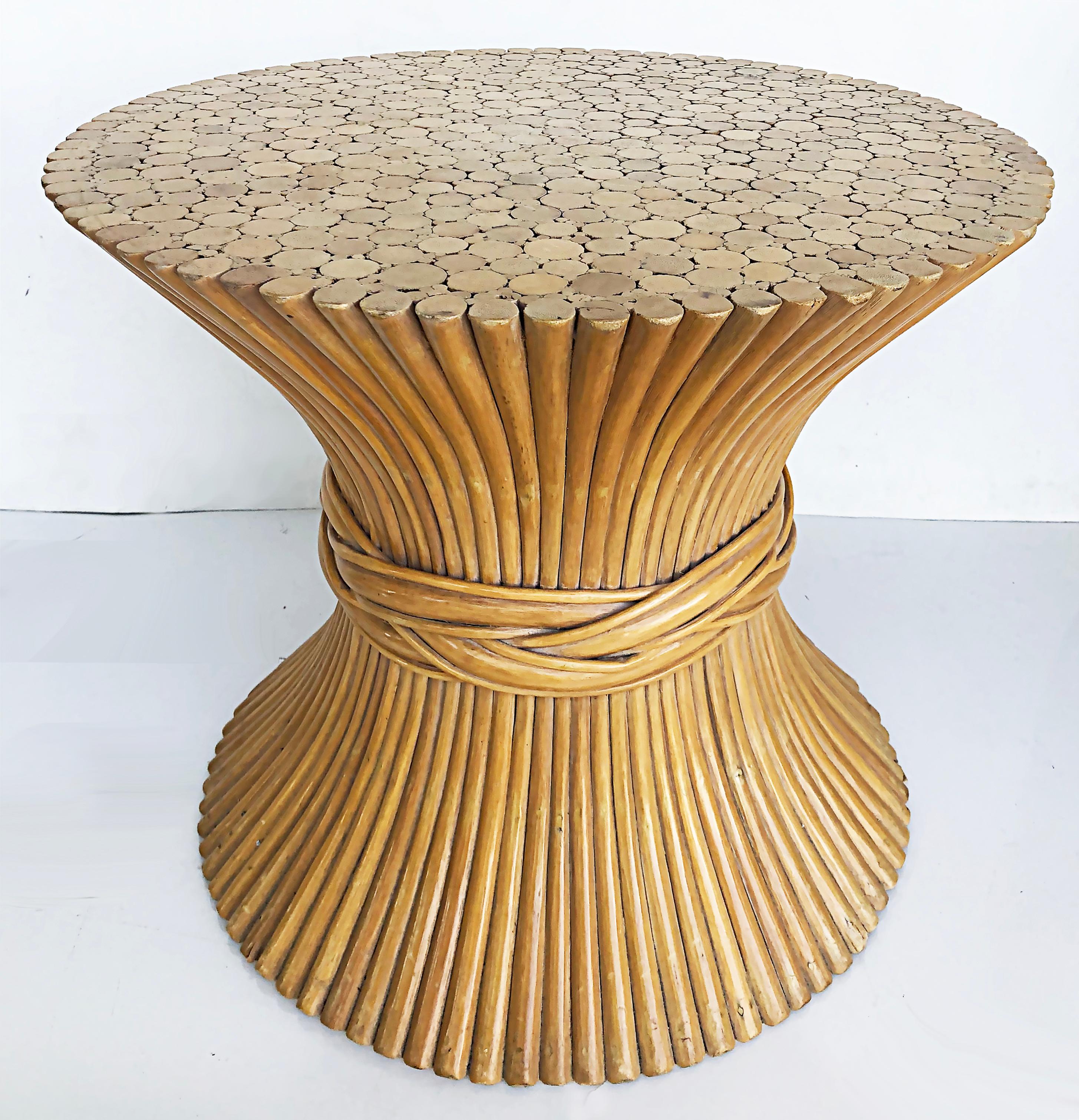 McGuire furniture sheaf of wheat glass top side table.

Offered for sale is a sheaf of wheat table with a new glass top by McGuire Furniture. The base is formed with bundled reeds with a woven band surrounding the center. The base supports a much