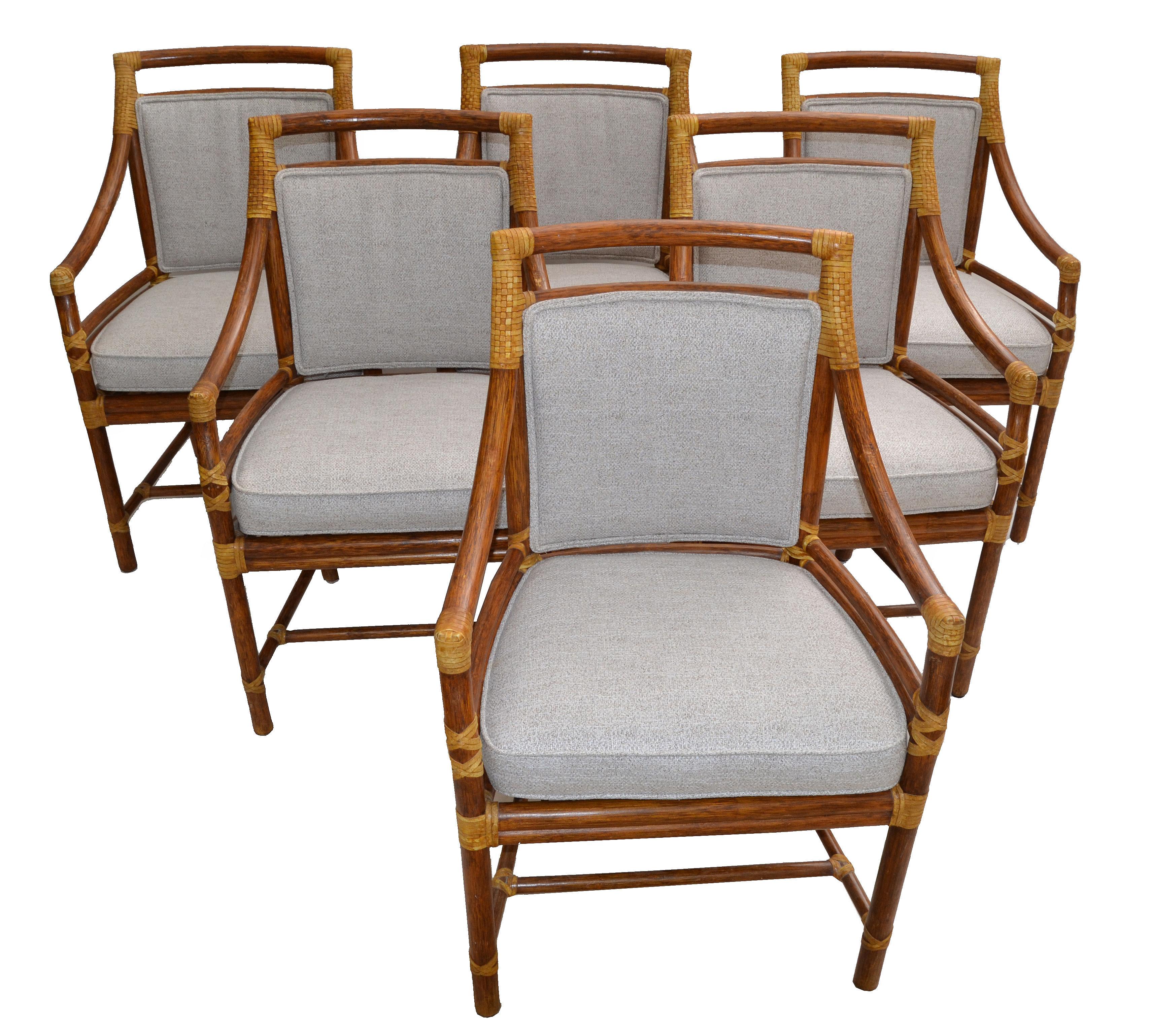 Set of 6 original McGuire bamboo and handwoven cane armchair, dining chair with leather bindings.
The upholstery is a beige boucle Fabric and note the stunner done backrest.
McGuire metal tag is attached underneath.
Measures: Arm height 25