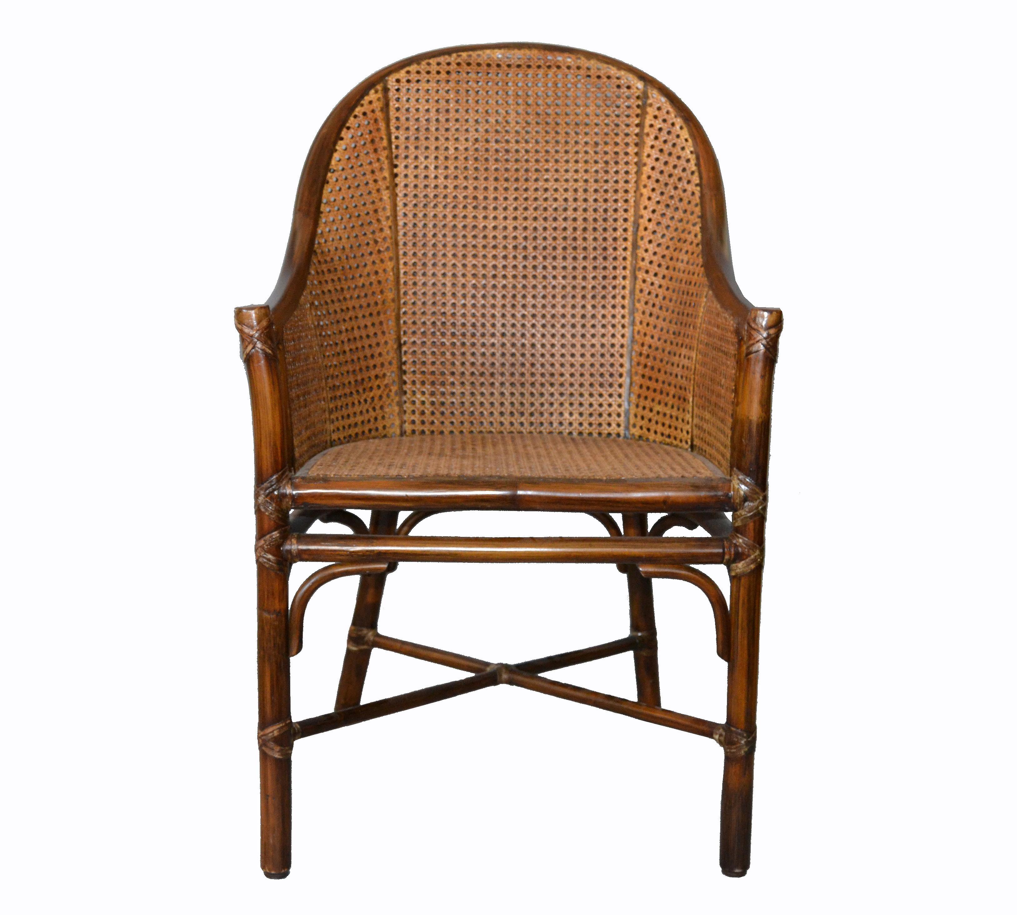 Original McGuire bamboo and handwoven cane armchair, desk chair with leather bindings.
McGuire metal tag is attached underneath.
Measures: Arm height 24 inches.