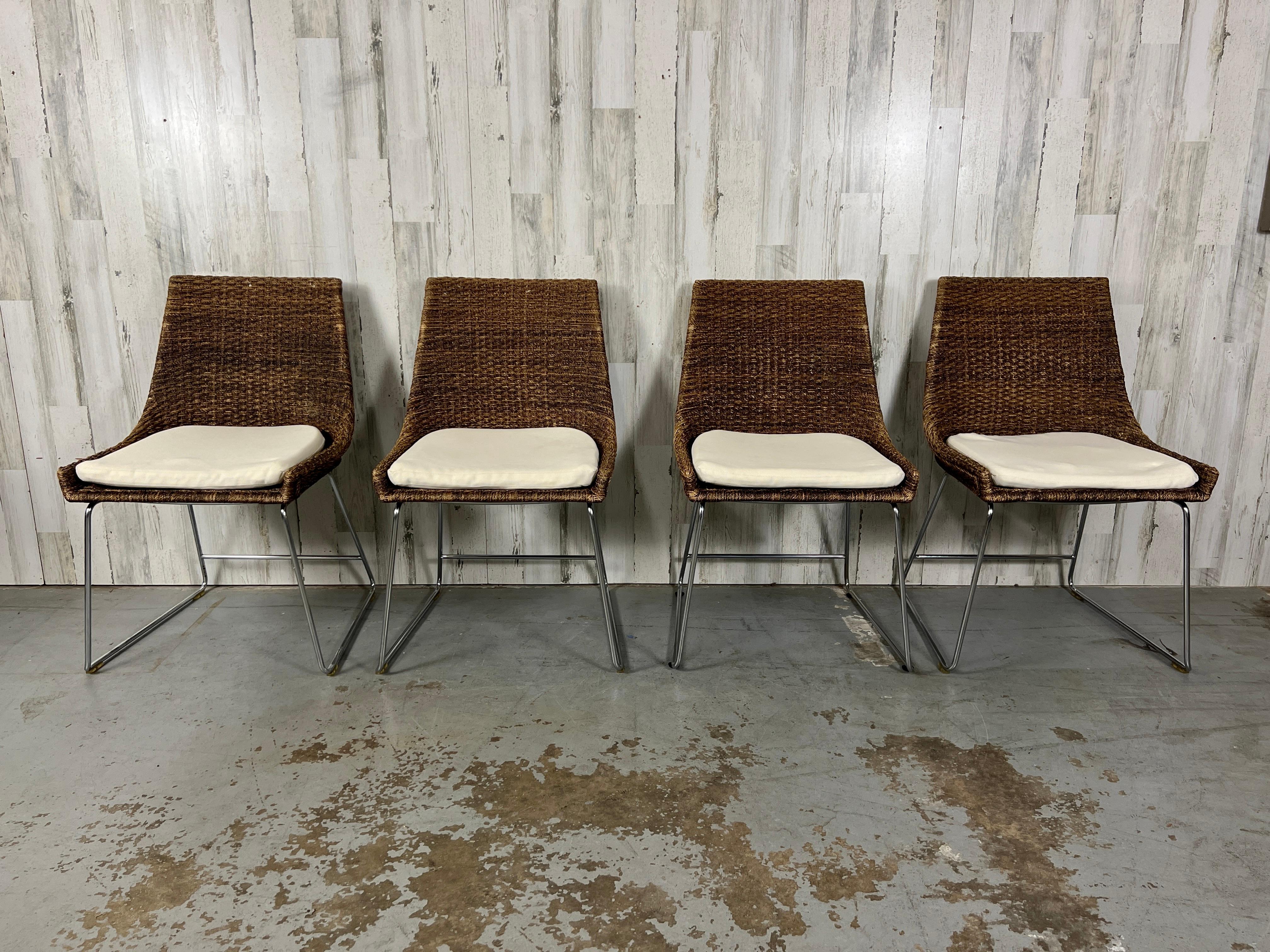 Vintage Mcguire organic modern dining chairs with woven Coco Abaca seats with chrome sled style legs.