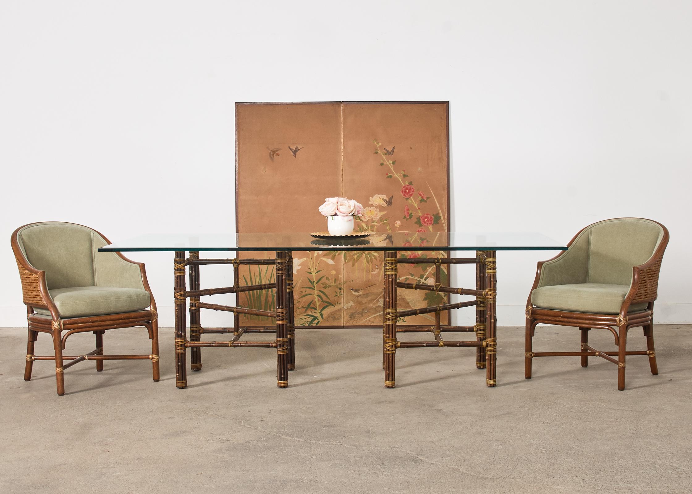 Large and rare bespoke dining table made in the California coastal organic modern style by McGuire, San Francisco. The table features double pedestal supports with a large rectangular pane of glass. The thick original McGuire glass was optional and