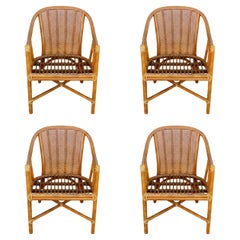 McGuire Rattan and Cane Barrel Dining Chairs, a Set of Four