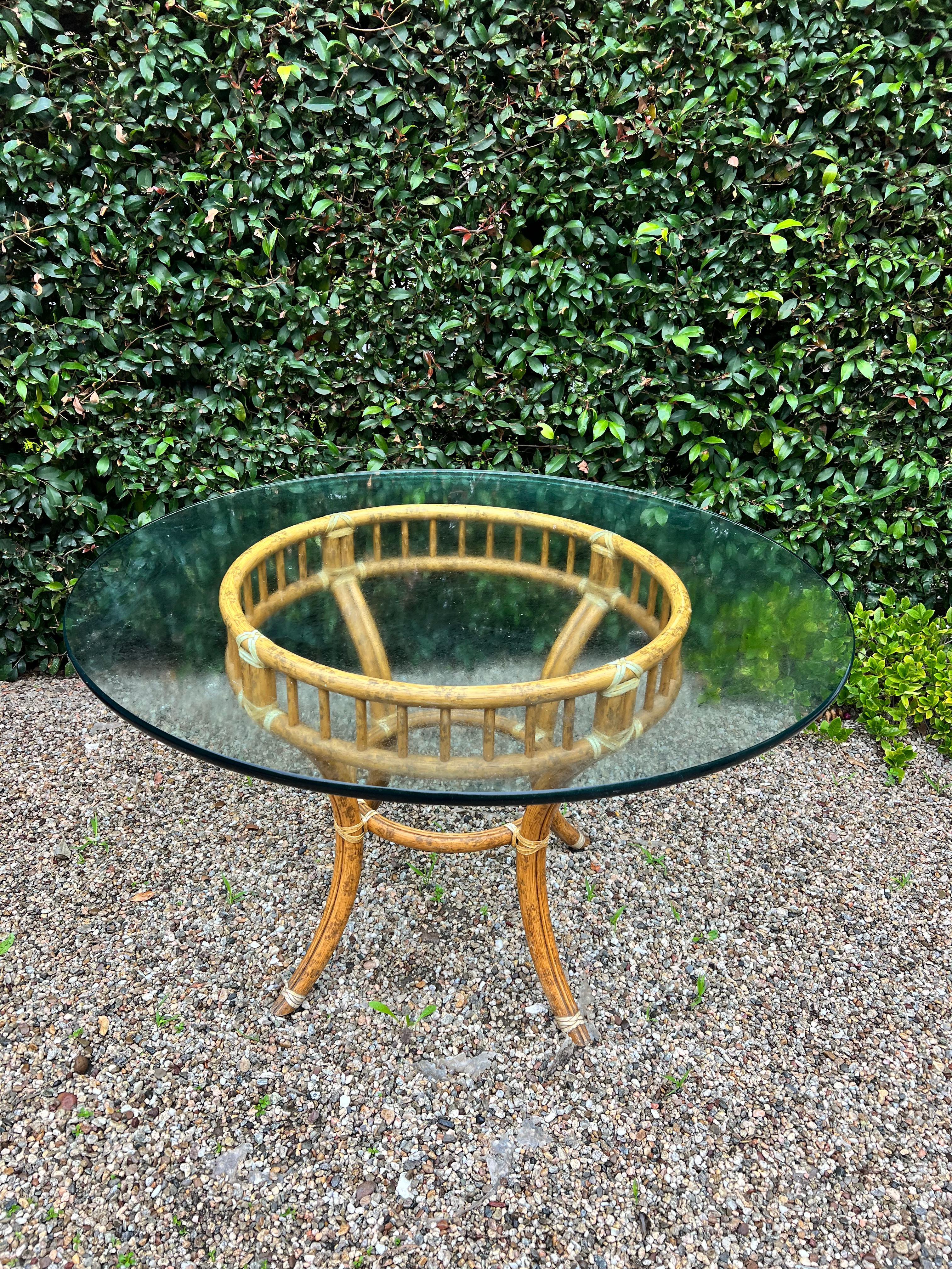 Patinated McGuire Rattan Dining Table with Glass Top For Sale