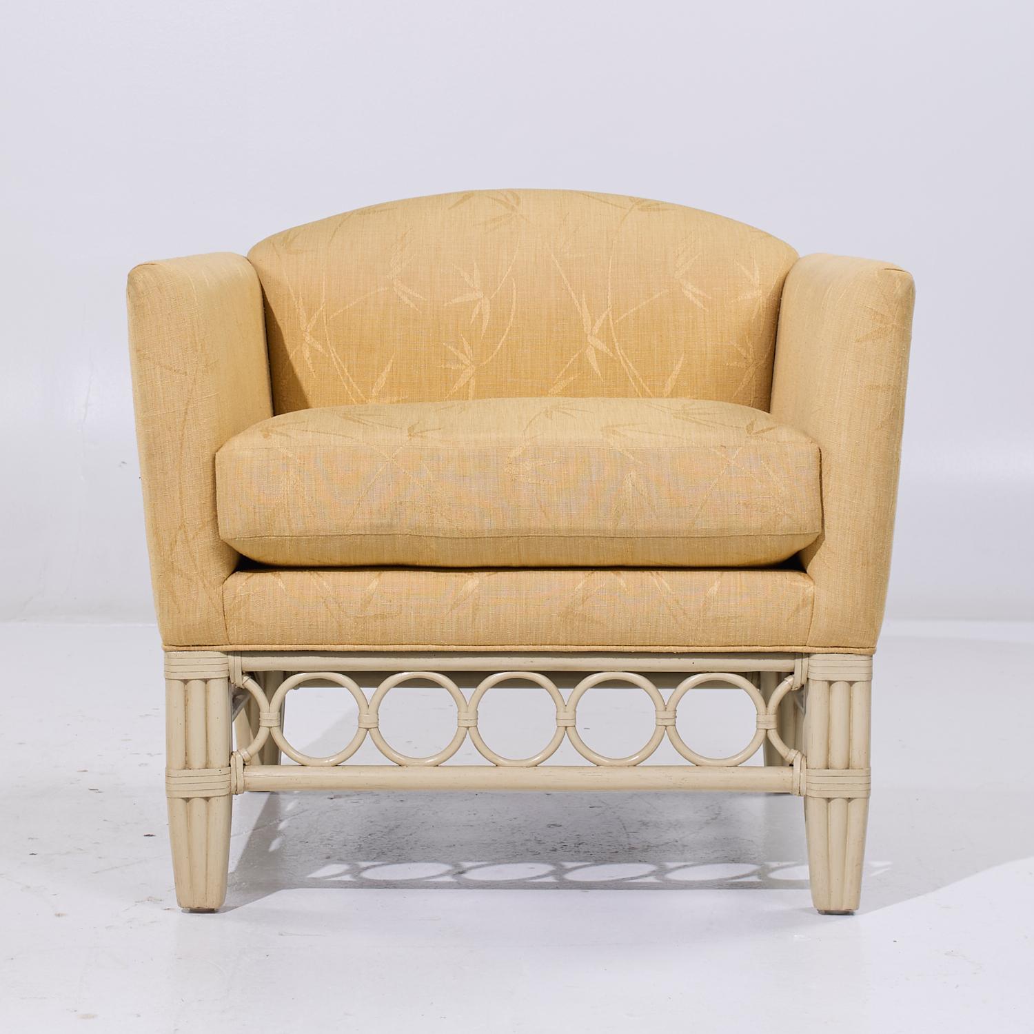 McGuire Rattan Lounge Chair

This chair measures: 34.25 wide x 33 deep x 32.5 high, with a seat height of 22 and arm height/chair clearance of 28.5 inches

We take our photos in a controlled lighting studio to show as much detail as possible. We do