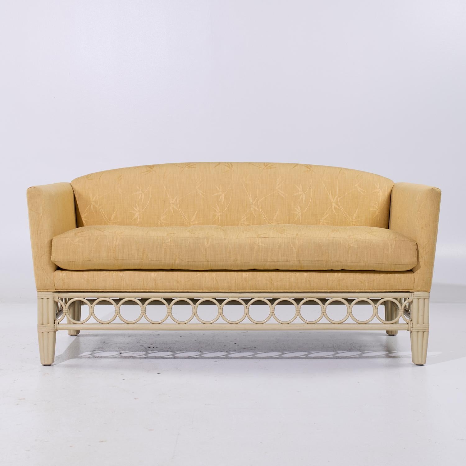 McGuire Rattan Sofa

This sofa measures: 66.5 wide x 33 deep x 33.25 inches high, with a seat height of 22 and arm height of 29 inches

We take our photos in a controlled lighting studio to show as much detail as possible. We do not Photoshop out