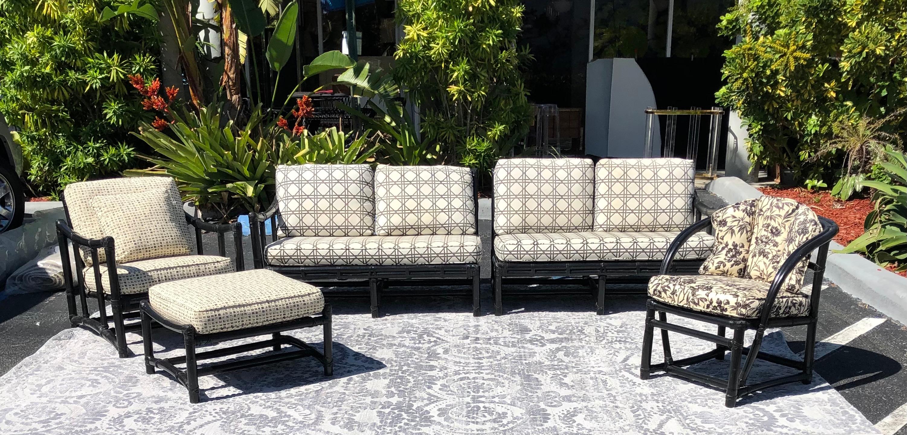McGuire San Francisco rattan living room suite set of five

Offered for sale is a McGuire Furniture (San Francisco, CA) living room suite comprised of a two-piece sectional sofa, a club chair with an ottoman, and a single club chair. All of the