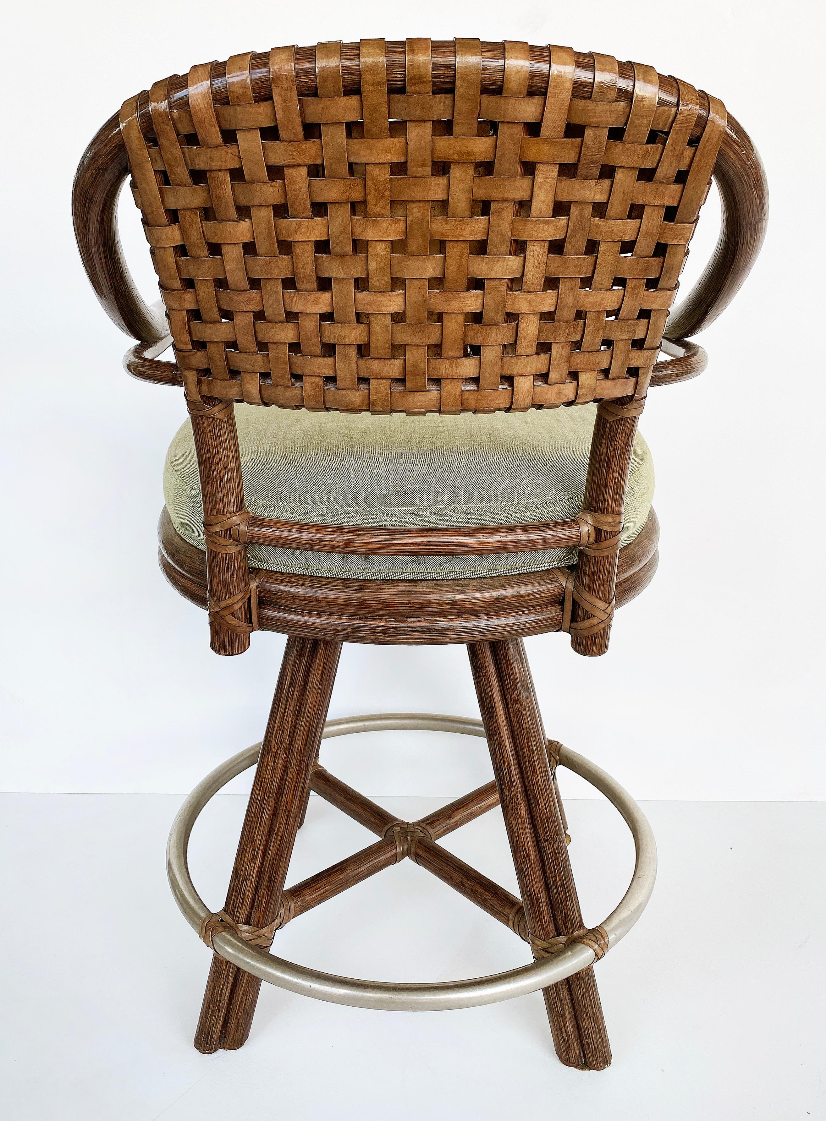 McGuire San Francisco Rattan, Rawhide Swivel Stools, Pair In Good Condition For Sale In Miami, FL