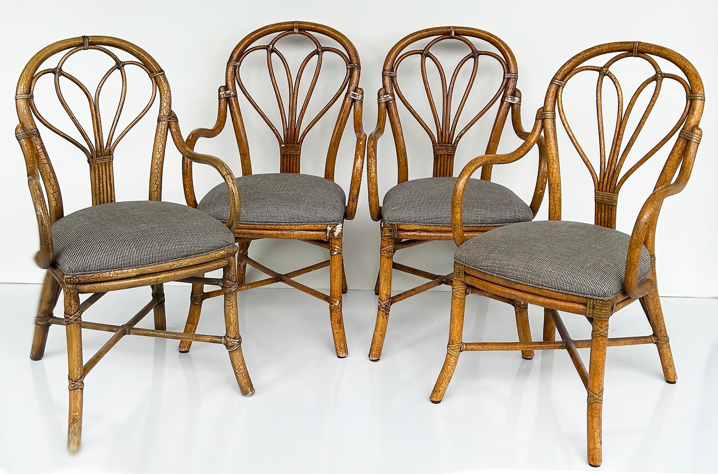 McGuire San Francisco Set of 4 Upholstered Rattan Armchairs with Rawhide

Offered for sale is a set of 4 upholstered rattan dining armchairs from McGuire San Francisco.   The chairs have rawhide-wrapped joints and the rattan has a craquelure finish.