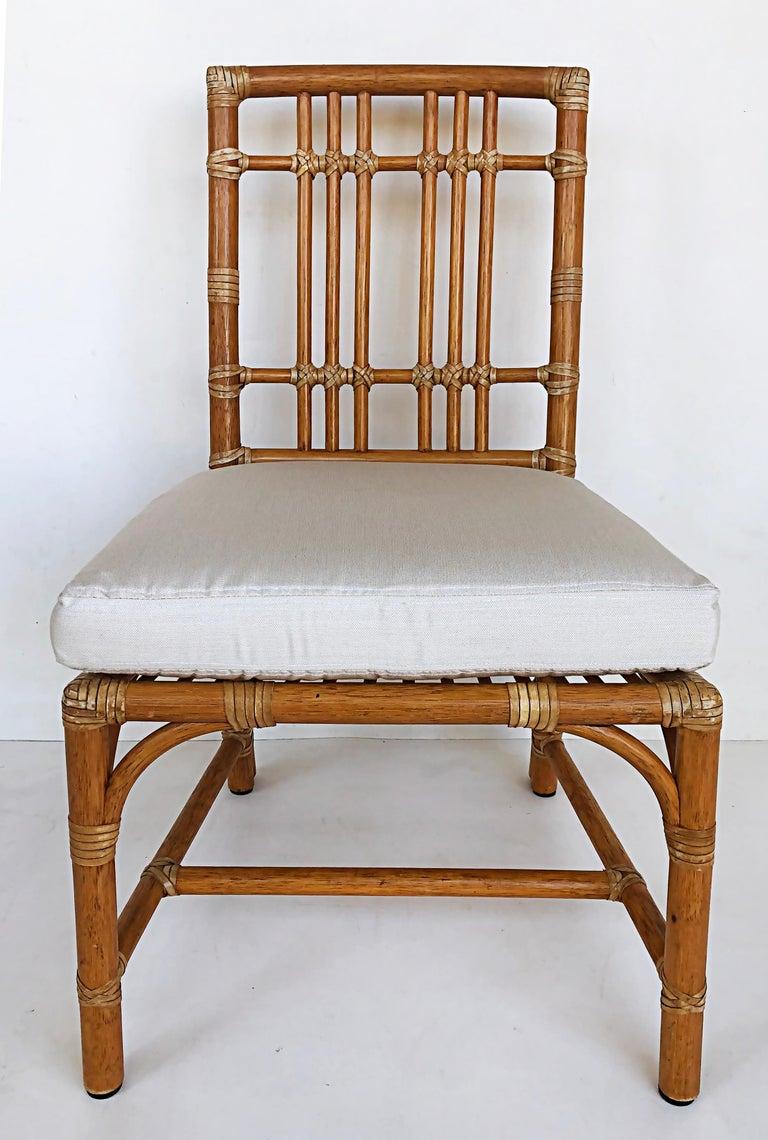 McGuire San Francisco Wood and Rawhide dining chairs, set of six

Offered for sale is a set of six (6) McGuire of San Francisco wood dining chairs with a rattan look. The frames have laced rawhide wrapped joints and details. The set has six newly
