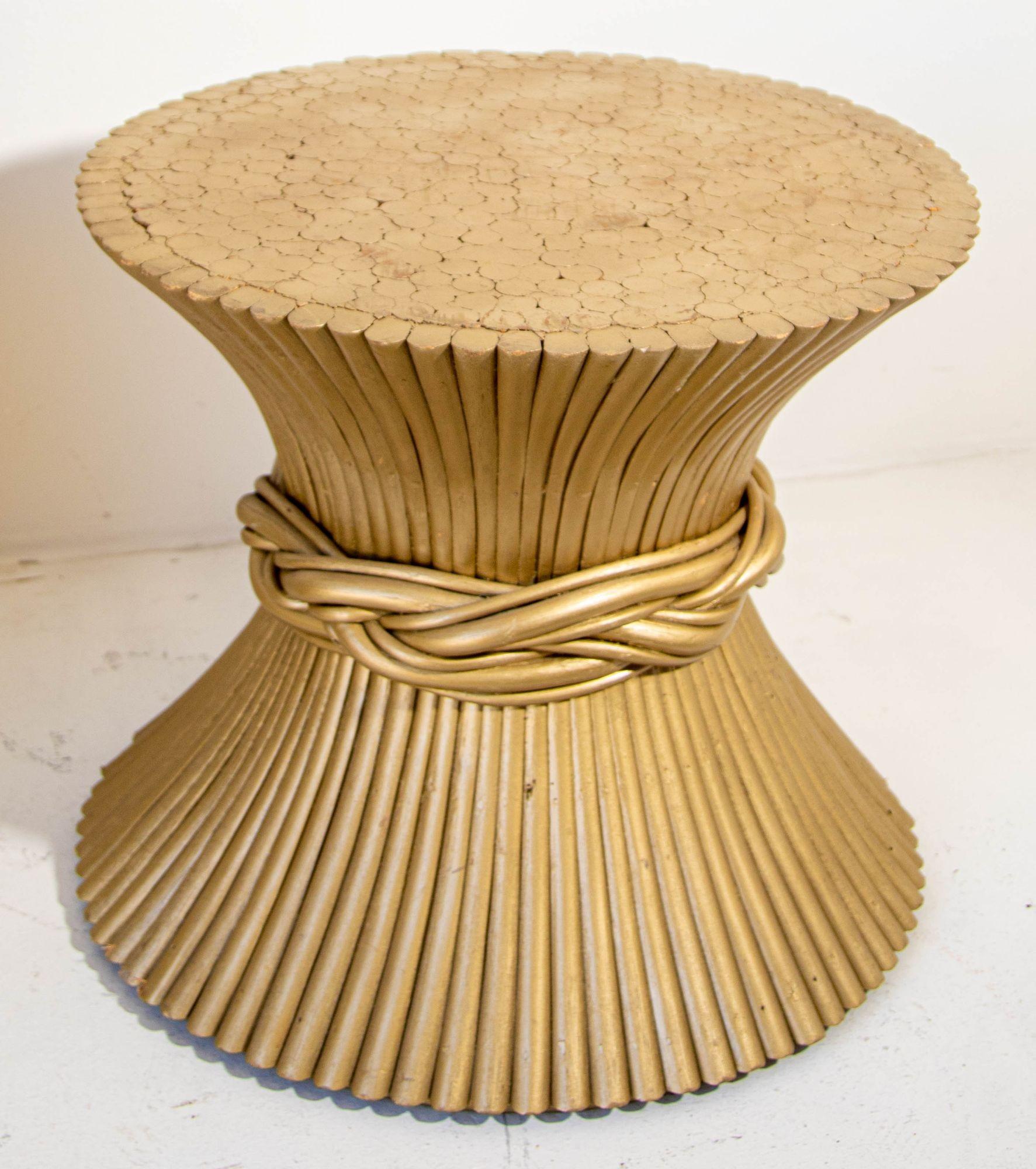 Large 1970s John Mcguire style sheaf of wheat bamboo round side or end, coffee tables.
Pair of large coffee table gilt painted sheaf of bamboo wheat side, end, occasional tables round pedestals attributed to McGuire.
Add a large piece of glass to