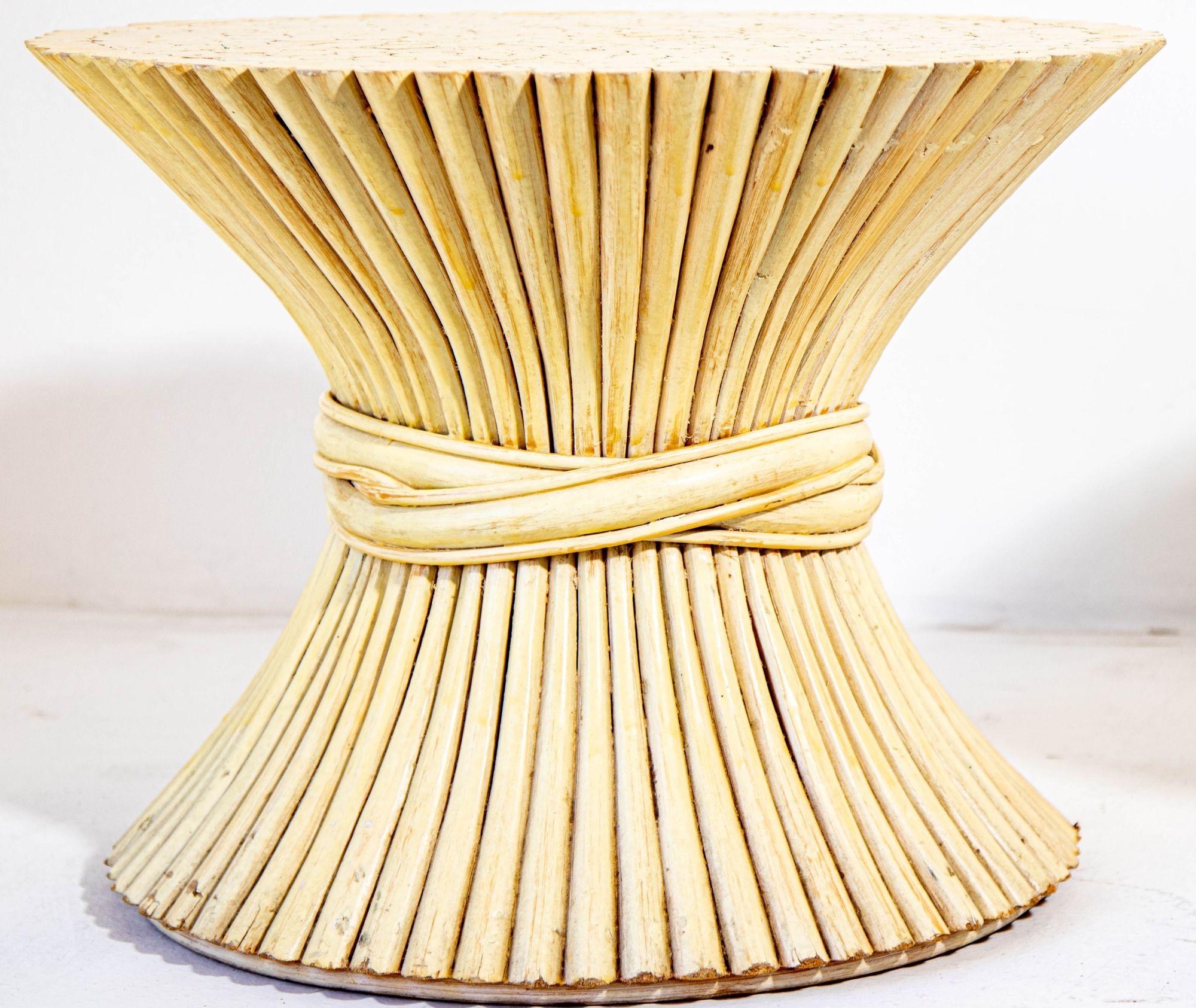 1970s John Mcguire style sheaf of wheat bamboo round side tables.
Pair of white washed sheaf of bamboo wheat side, end, occasional tables round pedestals attributed to McGuire.
Vintage coastal style braided pencil reed rattan occasional tables in