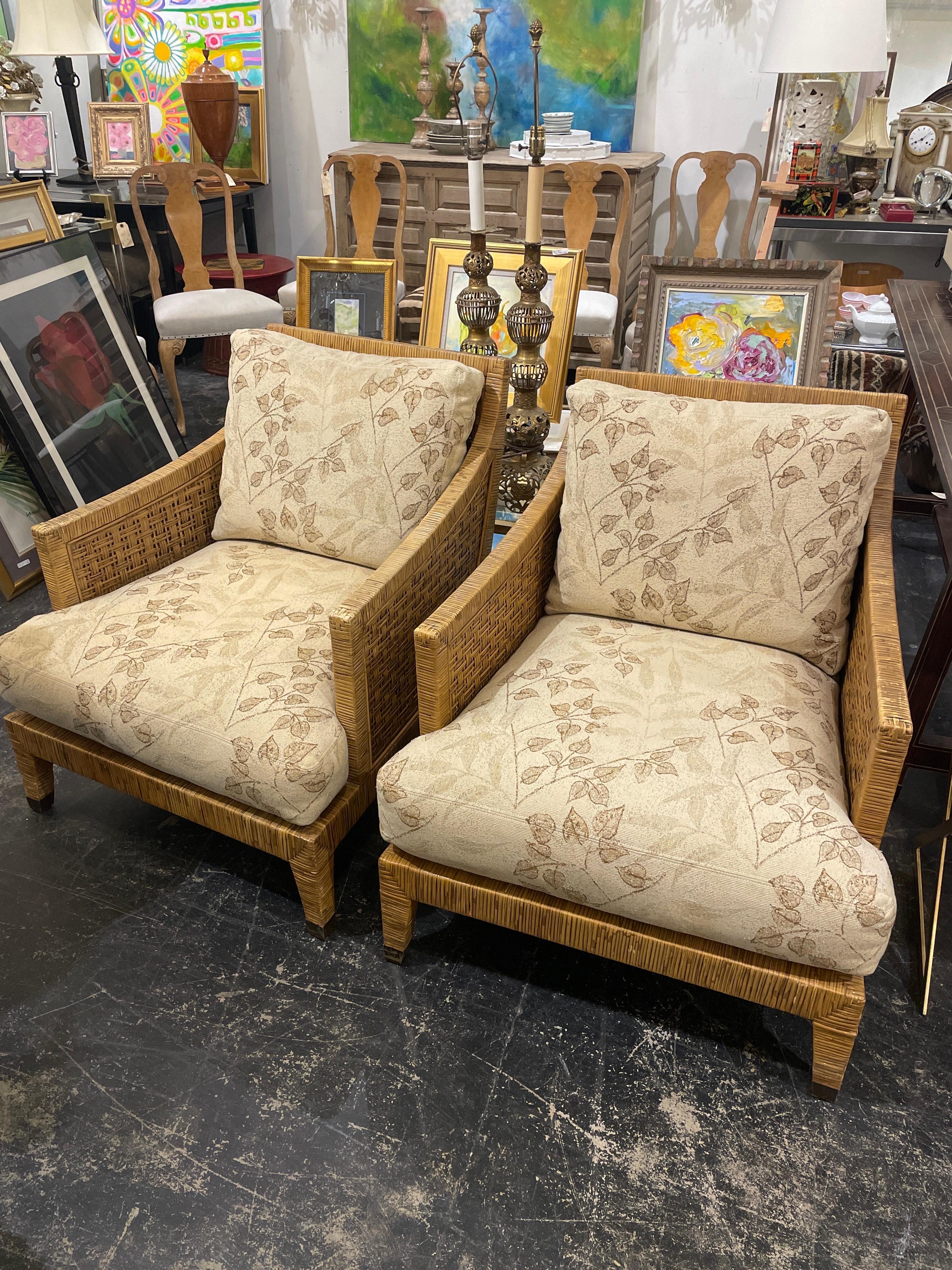 Indulge in luxurious relaxation with a pair of McGuire St. Germain Rattan Lounge Chairs, exuding timeless elegance and unparalleled comfort. Crafted with meticulous attention to detail, these chairs boast a seamless fusion of classic design and