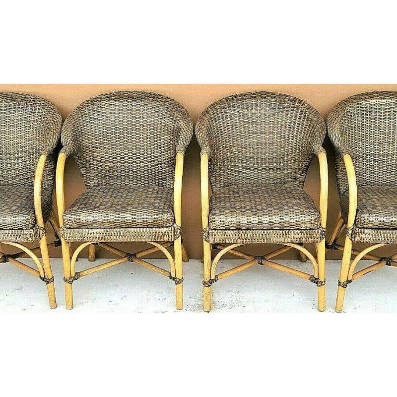 For full item description be sure to click on CONTINUE READING at the bottom of this listing. 

Offering one of our recent palm beach estate fine furniture acquisitions of a
set of 4 McGuire style laced leather bentwood bamboo rattan barrel